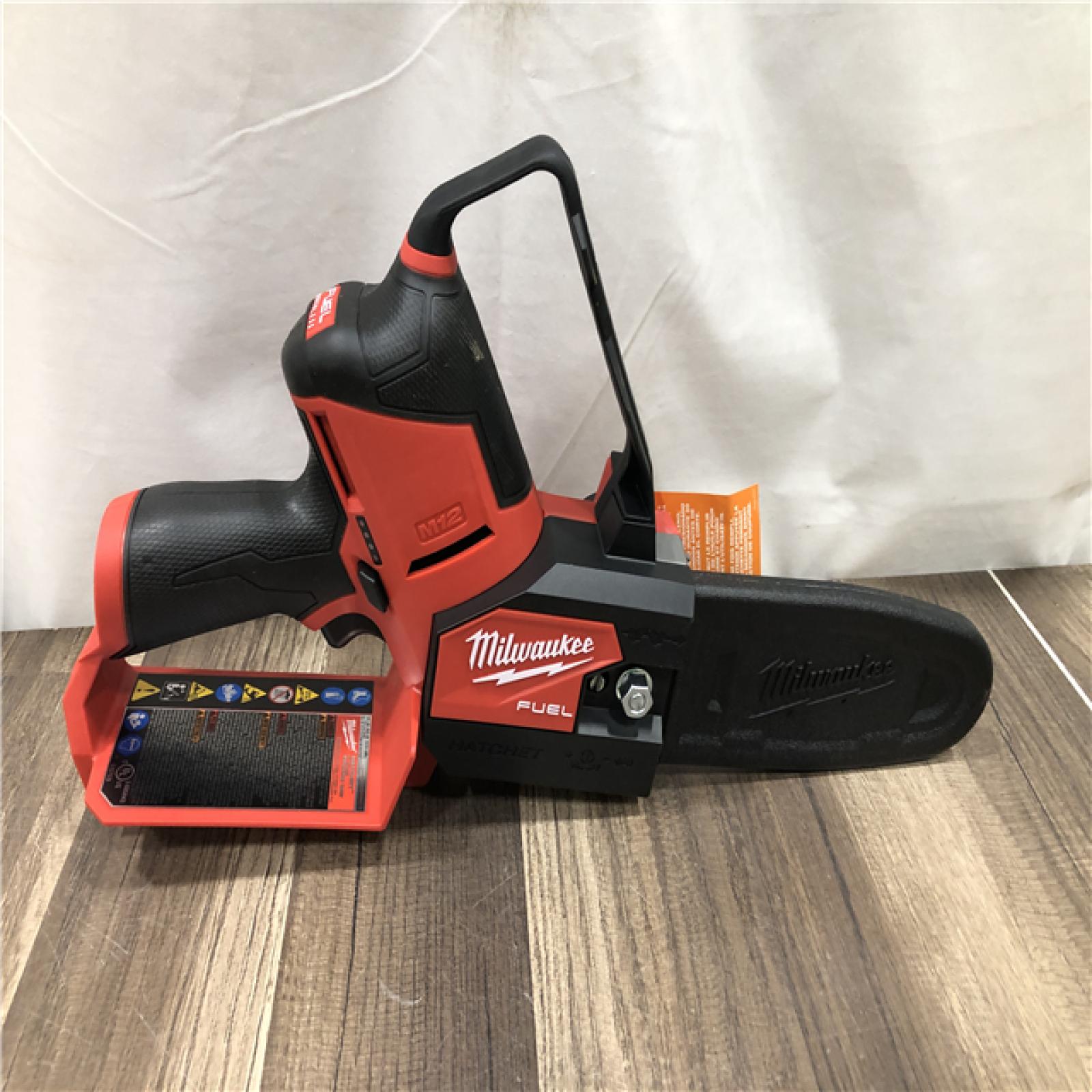 AS-IS Milwaukee FUEL 12V Lithium-Ion Brushless Battery 6 in. HATCHET Pruning Saw Kit