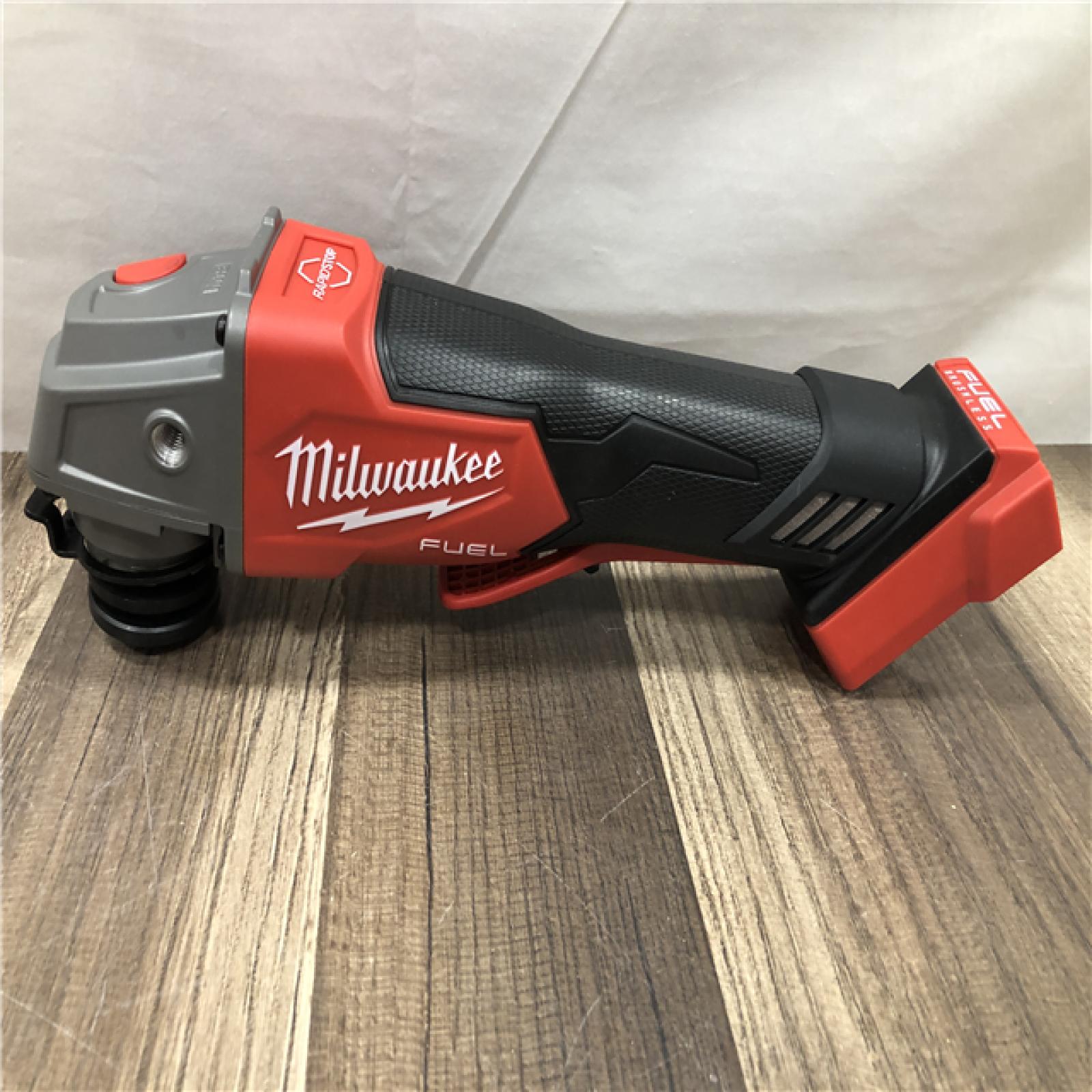 AS-IS Milwaukee FUEL 18V Lithium-Ion Brushless Cordless 4-1/2 in./5 in. Grinder w/Paddle Switch (Tool-Only)