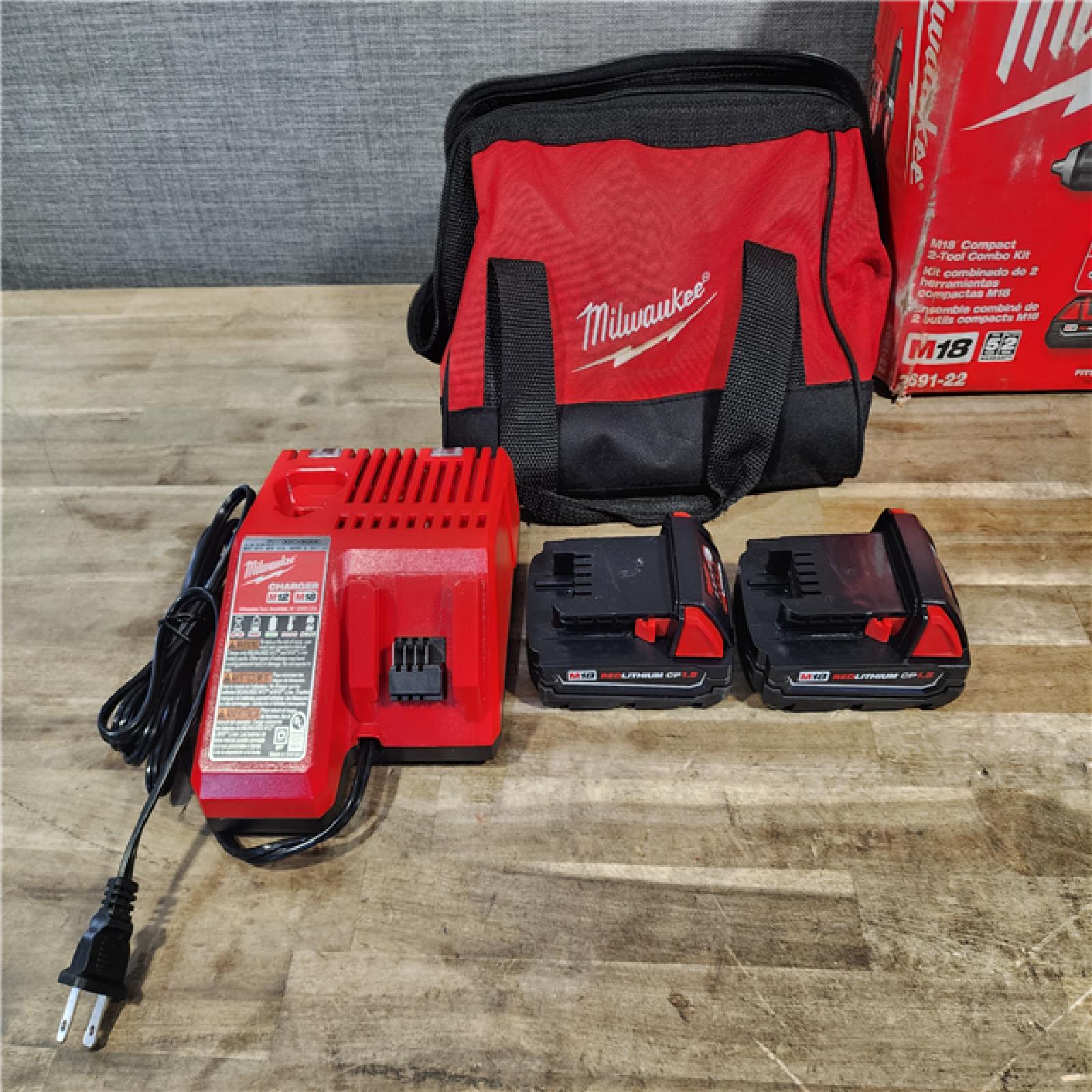 HOUSTON LOCATION - AS-IS Milwaukee 18V Cordless Brushed 2-Tool Drill/Driver and Impact Driver Kit