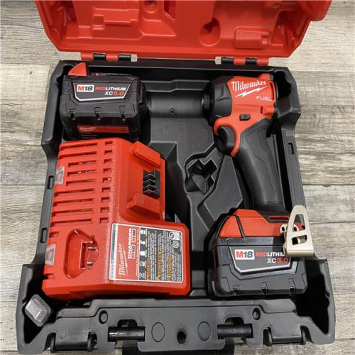 AS-IS Milwaukee FUEL SURGE 18V Lithium-Ion Brushless Cordless 1/4 in. Hex Impact Driver with (2) 5.0 Ah Battery and Charger