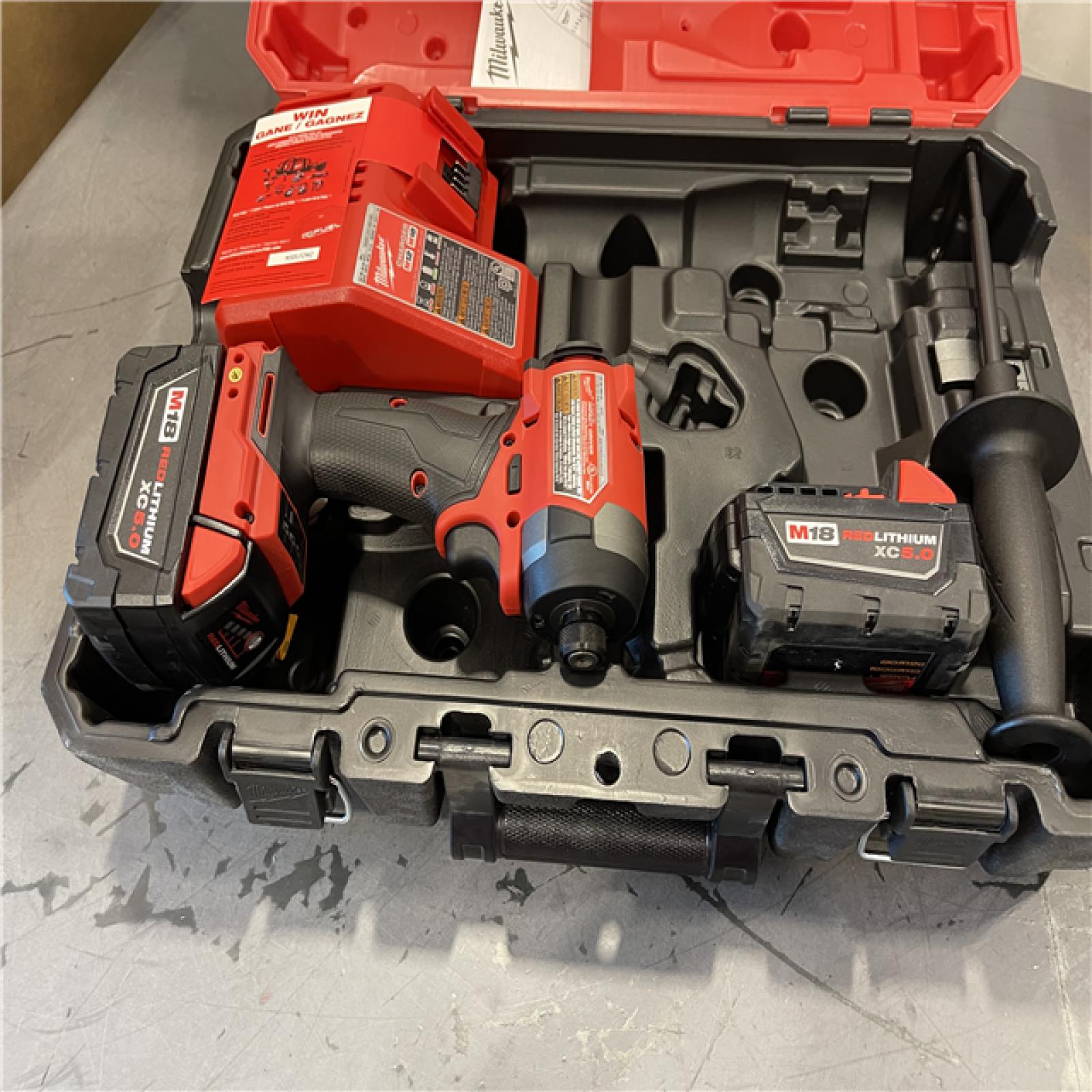 AS-IS - Milwaukee M18 FUEL 18-Volt Lithium Ion Brushless Cordless 1/4 in. Hex Impact Driver Kit