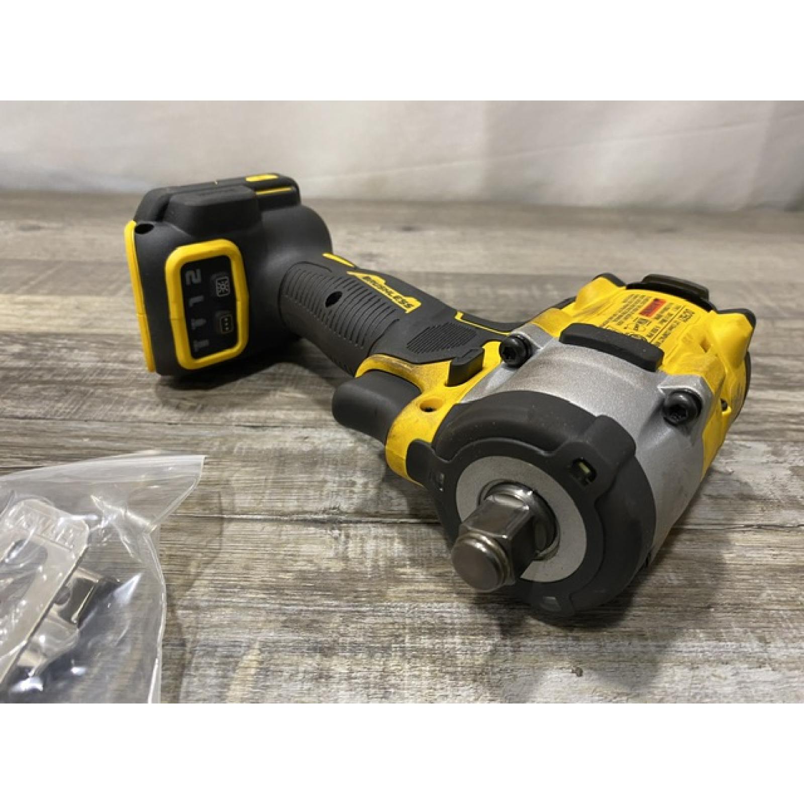 AS-IS DEWALT ATOMIC 20V MAX Cordless Brushless 1/2 in. Variable Speed Impact Wrench (Tool Only)