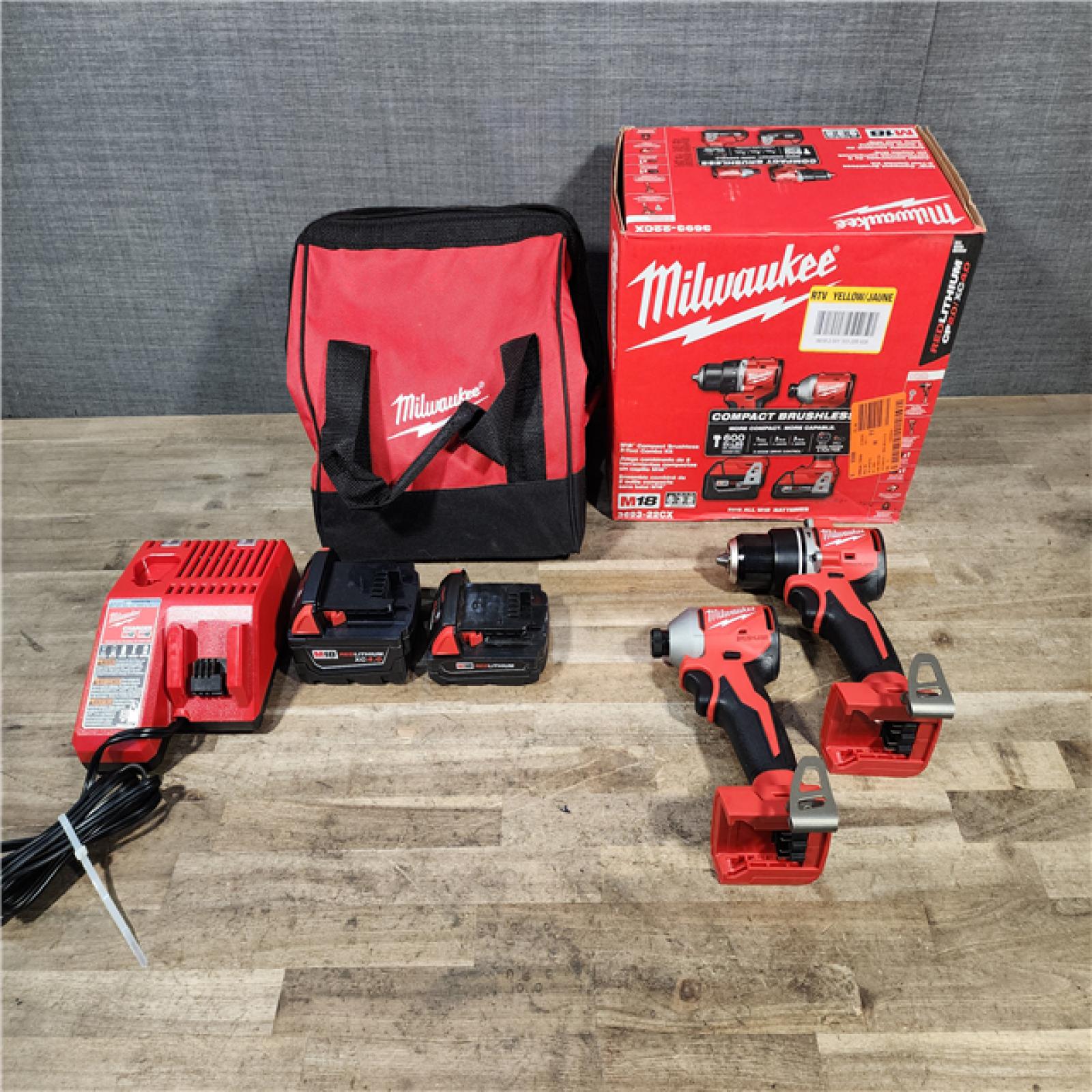 HOUSTON LOCATION - AS-IS M18 18-Volt Lithium-Ion Brushless Cordless Compact Hammer Drill/Impact Combo Kit (2-Tool) with (2) Batteries  Bag