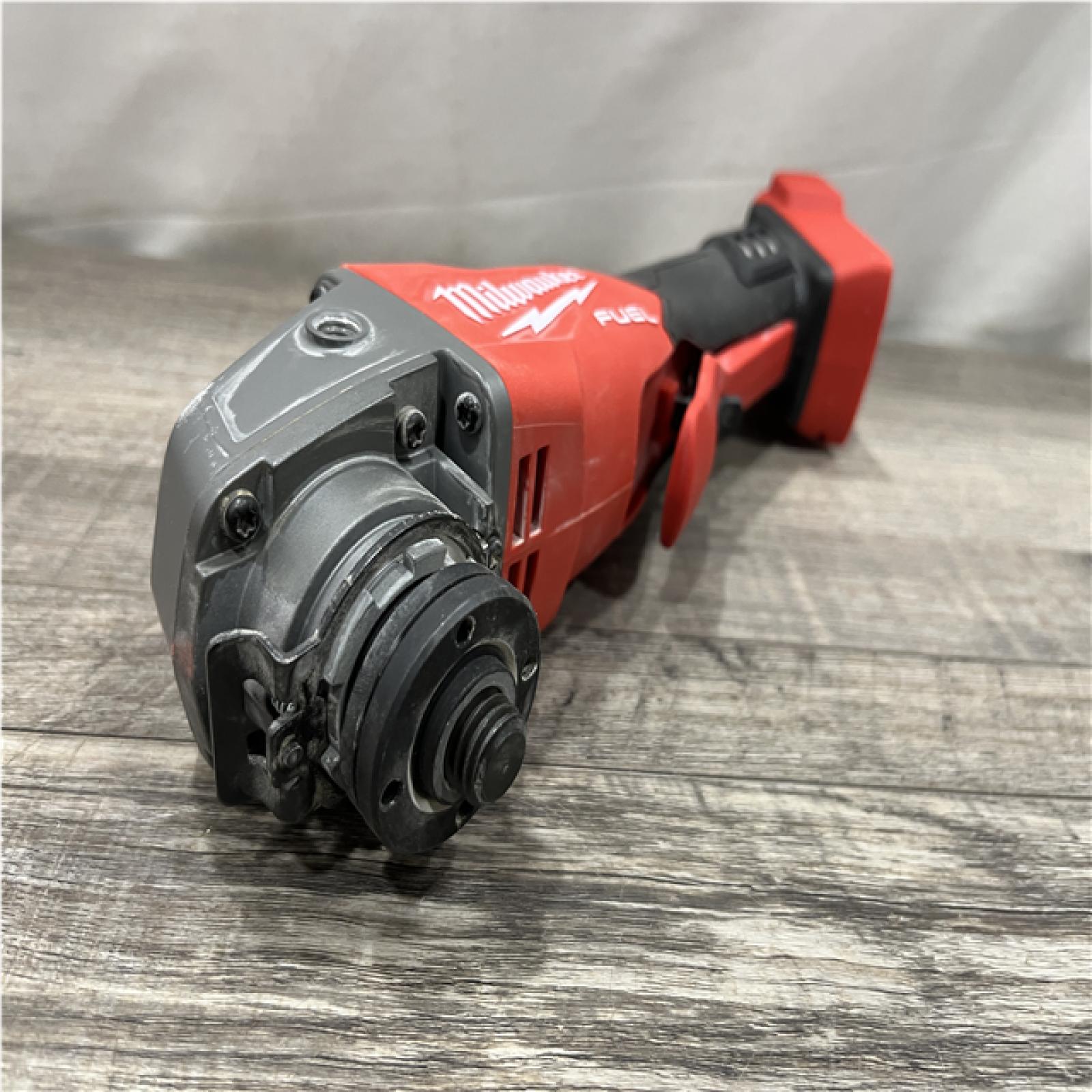 AS-IS Milwaukee FUEL 18V Lithium-Ion Brushless Cordless 4-1/2 in./5 in. Grinder w/Paddle Switch (Tool-Only)