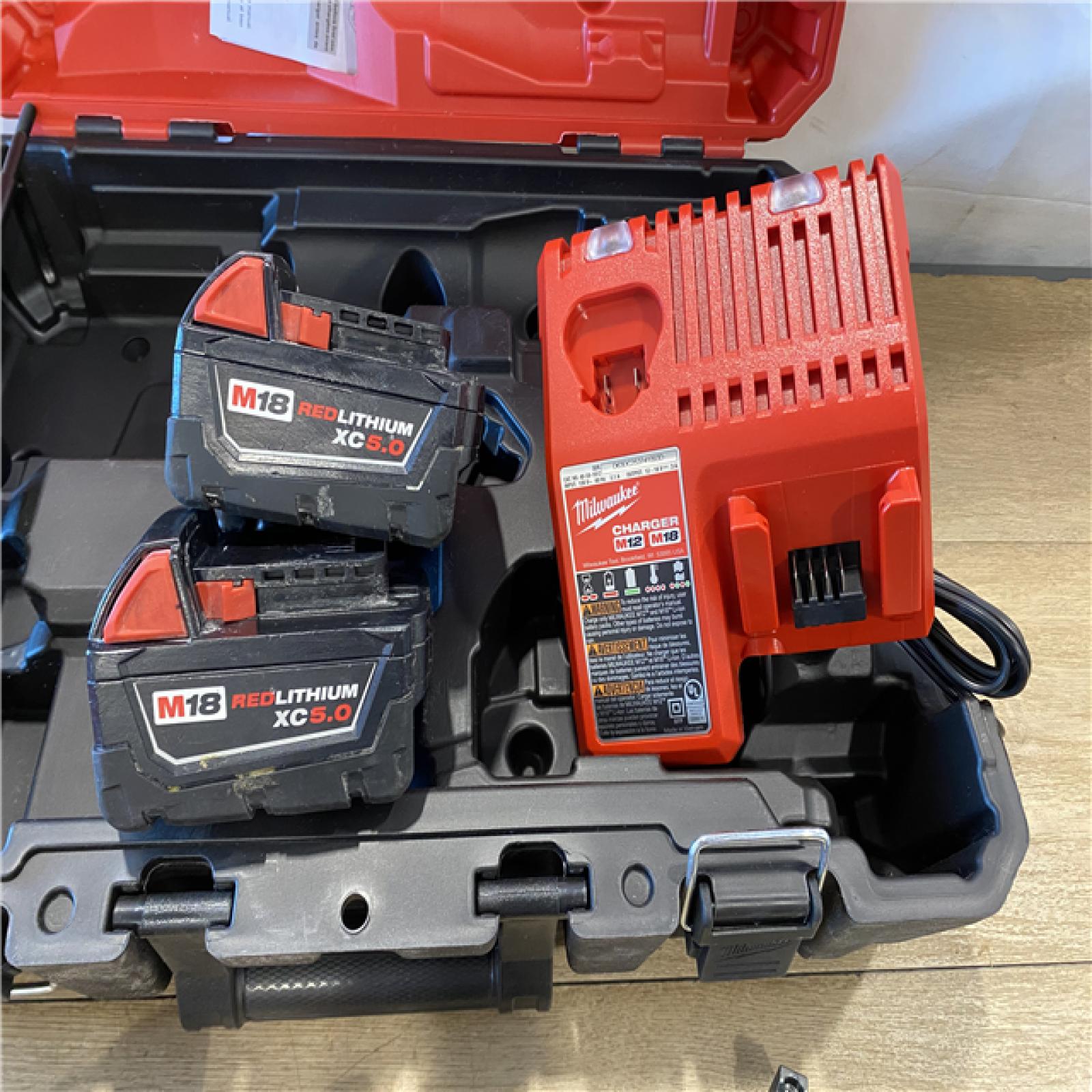 AS-IS Milwaukee FUEL 18V Lithium-Ion Brushless Cordless Hammer Drill and Impact Driver Combo Kit