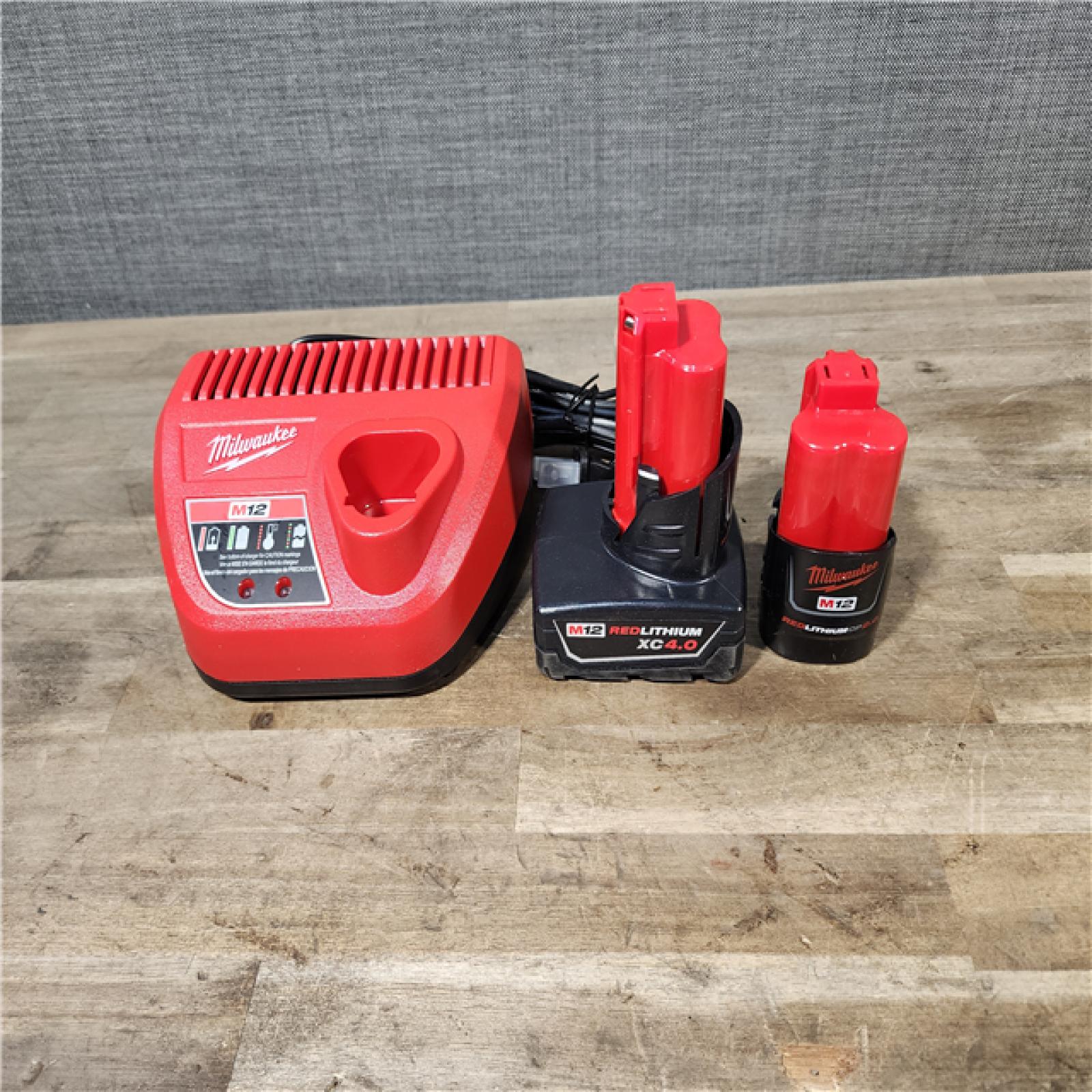 HOUSTON LOCATION - AS-IS Milwaukee 3497-22 12V Brushless Hammer Drill and Impact Driver Combo Kit