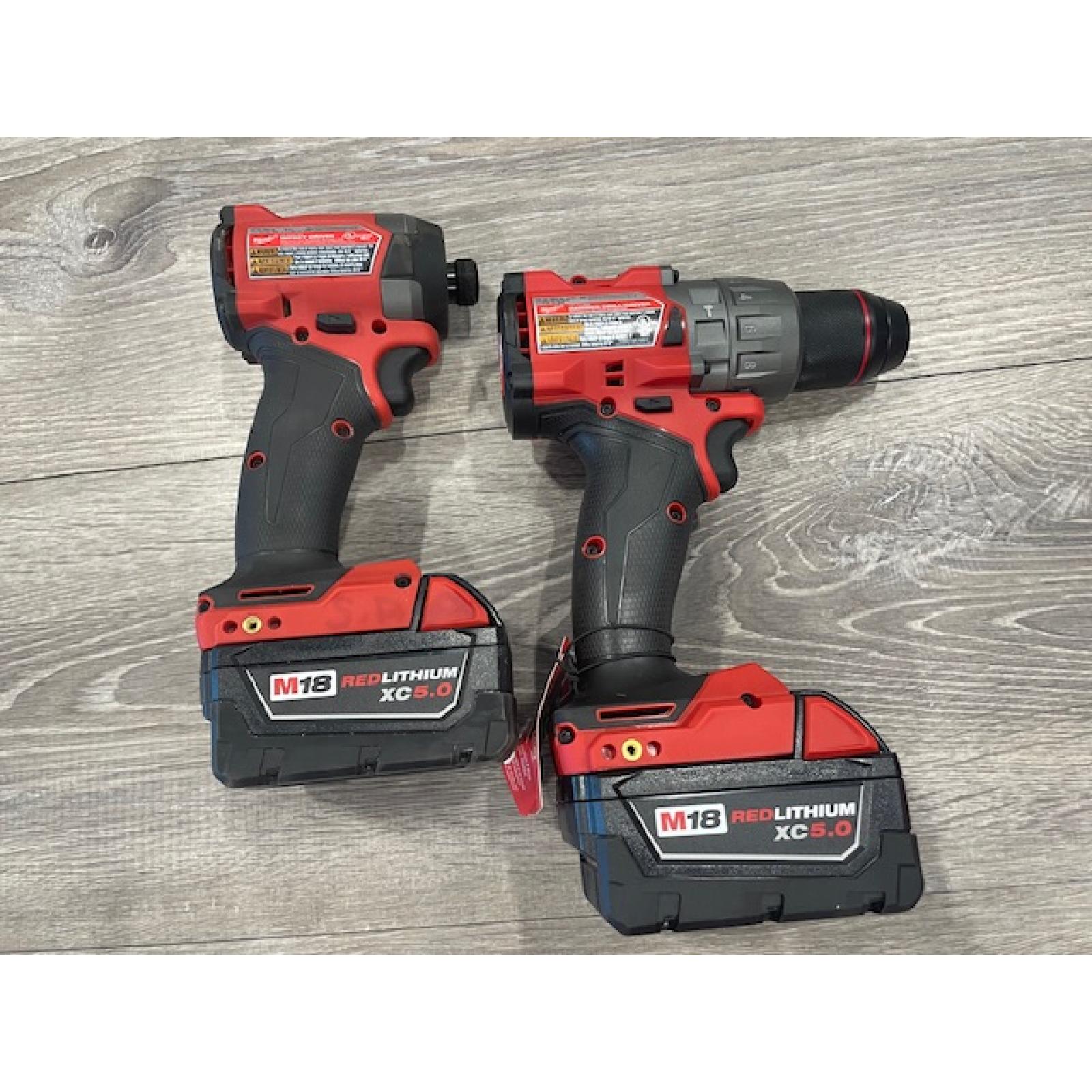 AS-IS Milwaukee FUEL 18V Lithium-Ion Brushless Cordless Hammer Drill and Impact Driver Combo Kit