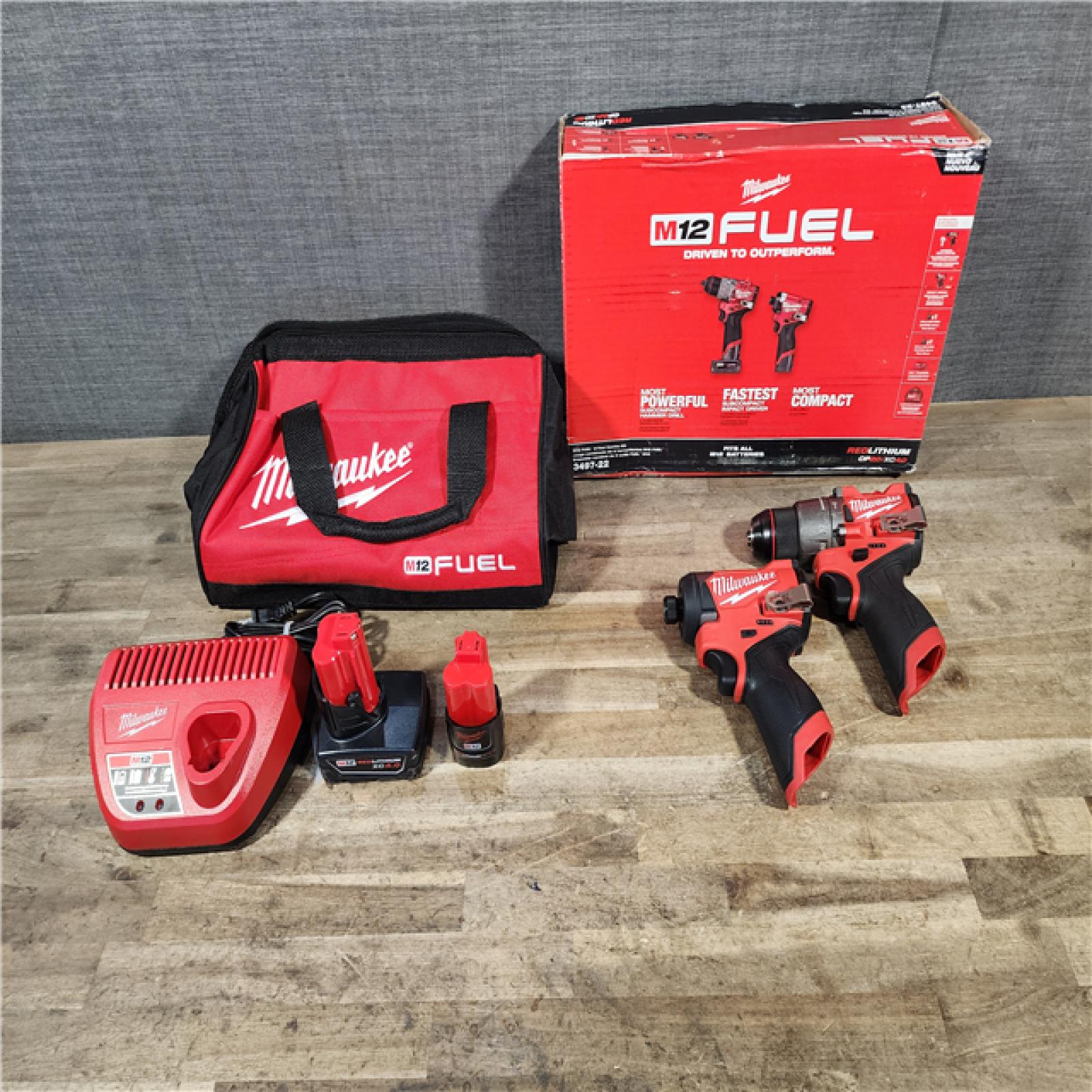 HOUSTON LOCATION - AS-IS Milwaukee FUEL 12-Volt Lithium-Ion Brushless Cordless Hammer Drill and Impact Driver Combo Kit