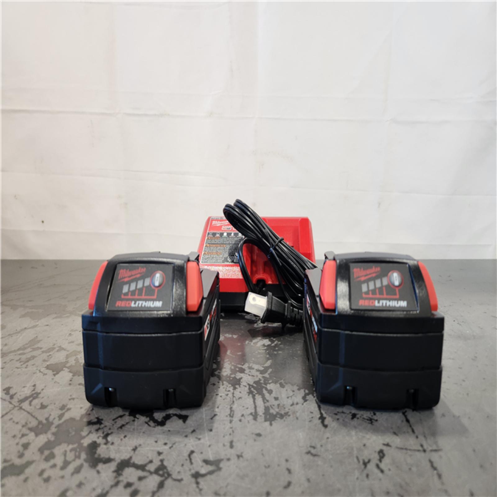 AS-IS- Milwaukee 18-Volt Lithium-Ion XC Starter Kit with Two 5.0Ah Batteries and Charger