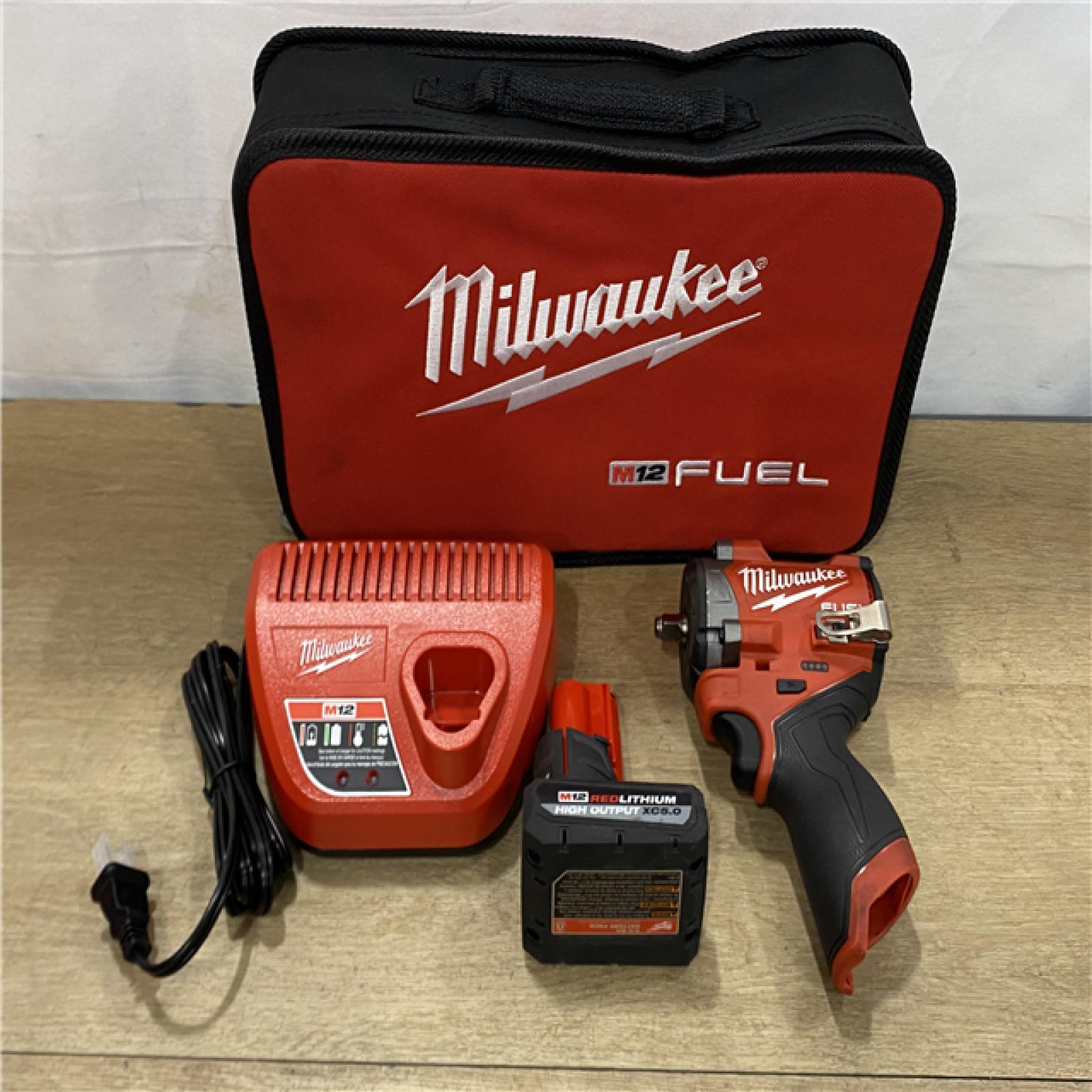 AS-IS Milwaukee FUEL 12V Li-Ion Brushless Cordless Stubby 3/8 in. Impact Wrench Kit