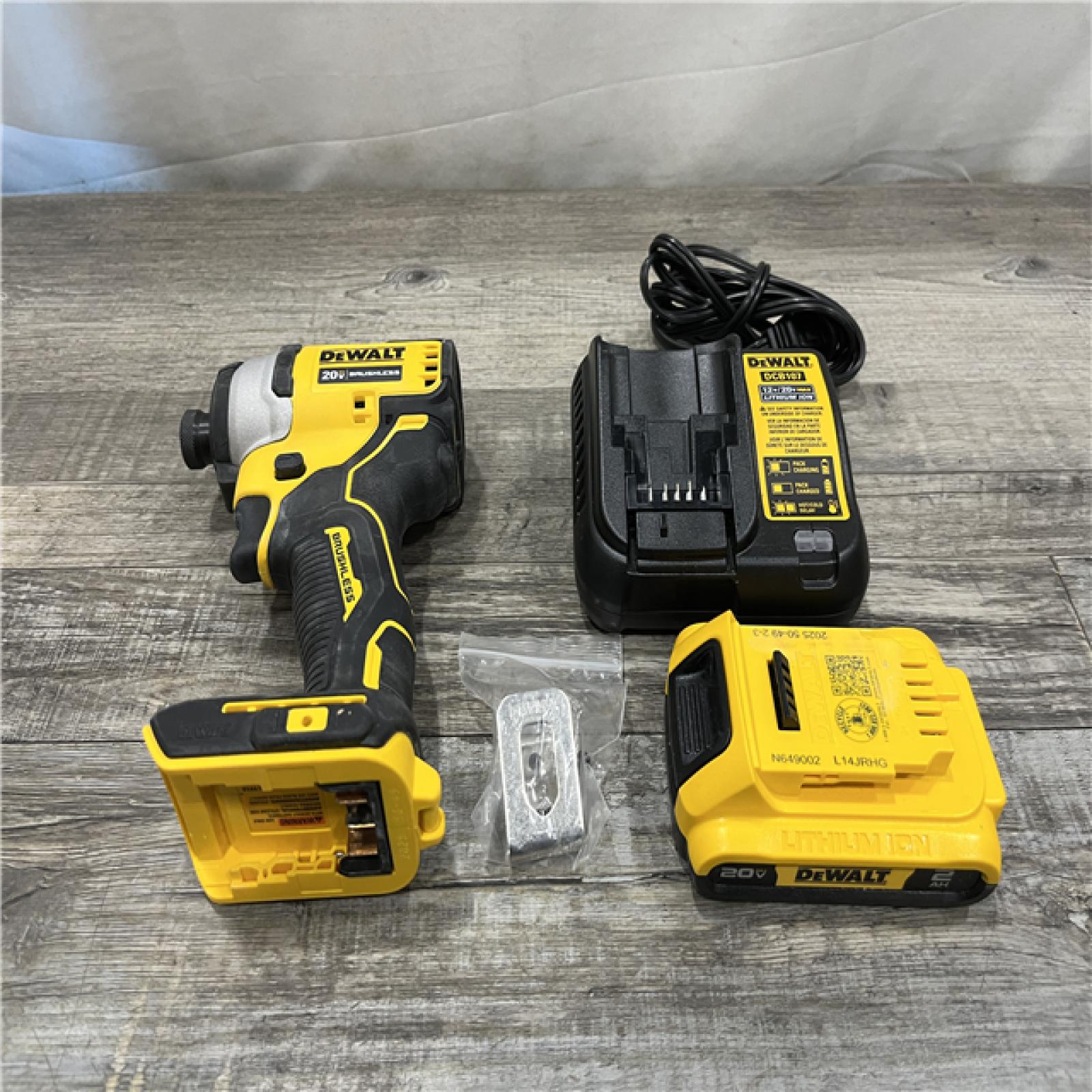 AS-IS DEWALT Atomic 20V Max Lithium-Ion Brushless Cordless Compact 1/4 in. Impact Driver Kit
