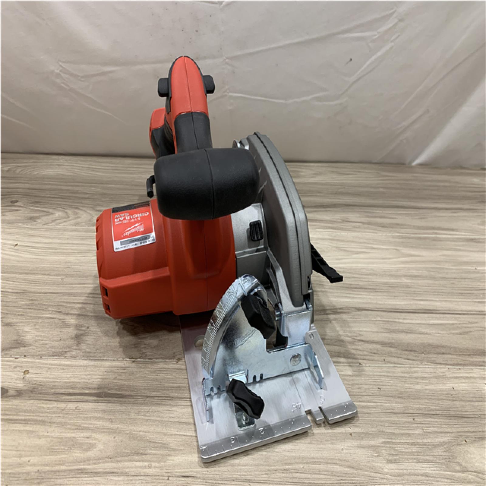 AS-IS Milwaukee 18V Lithium-Ion Cordless 6-1/2 in. Circular Saw (Tool-Only)