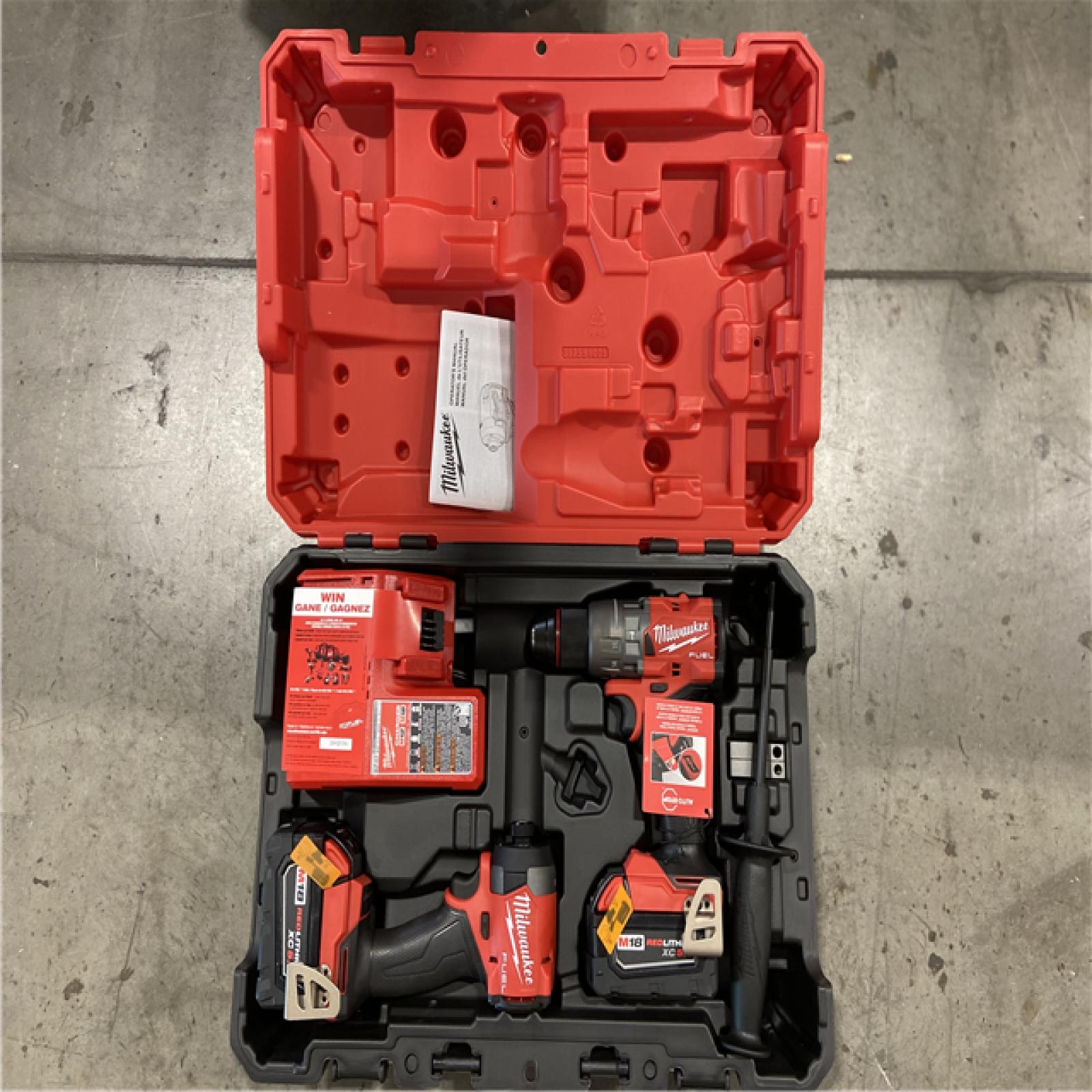 LIKE NEW - Milwaukee M18 FUEL 18V Lithium-Ion Brushless Cordless Hammer Drill and Impact Driver Combo Kit