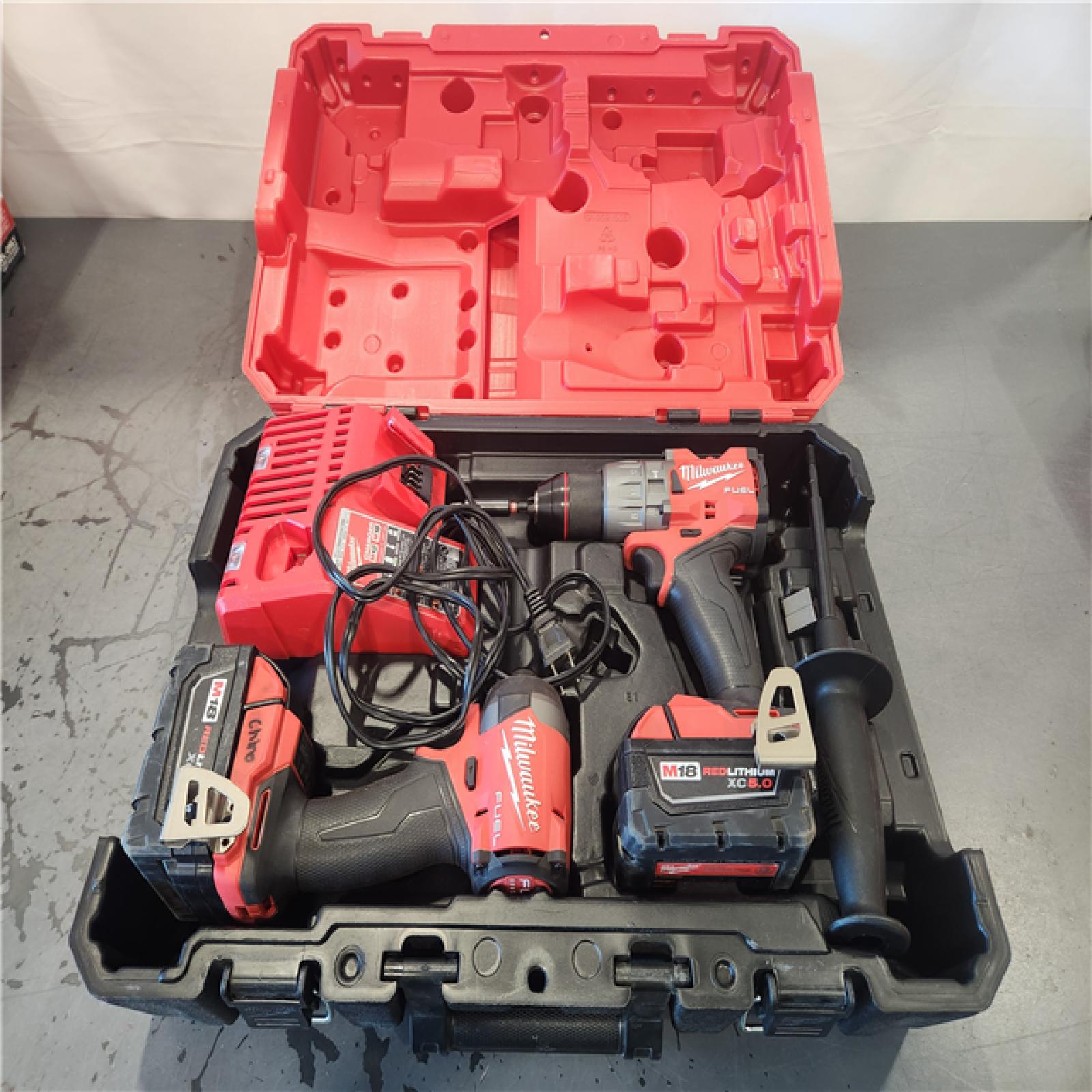 AS-IS- Milwaukee FUEL 18V Lithium-Ion Brushless Cordless Hammer Drill and Impact Driver Combo Kit