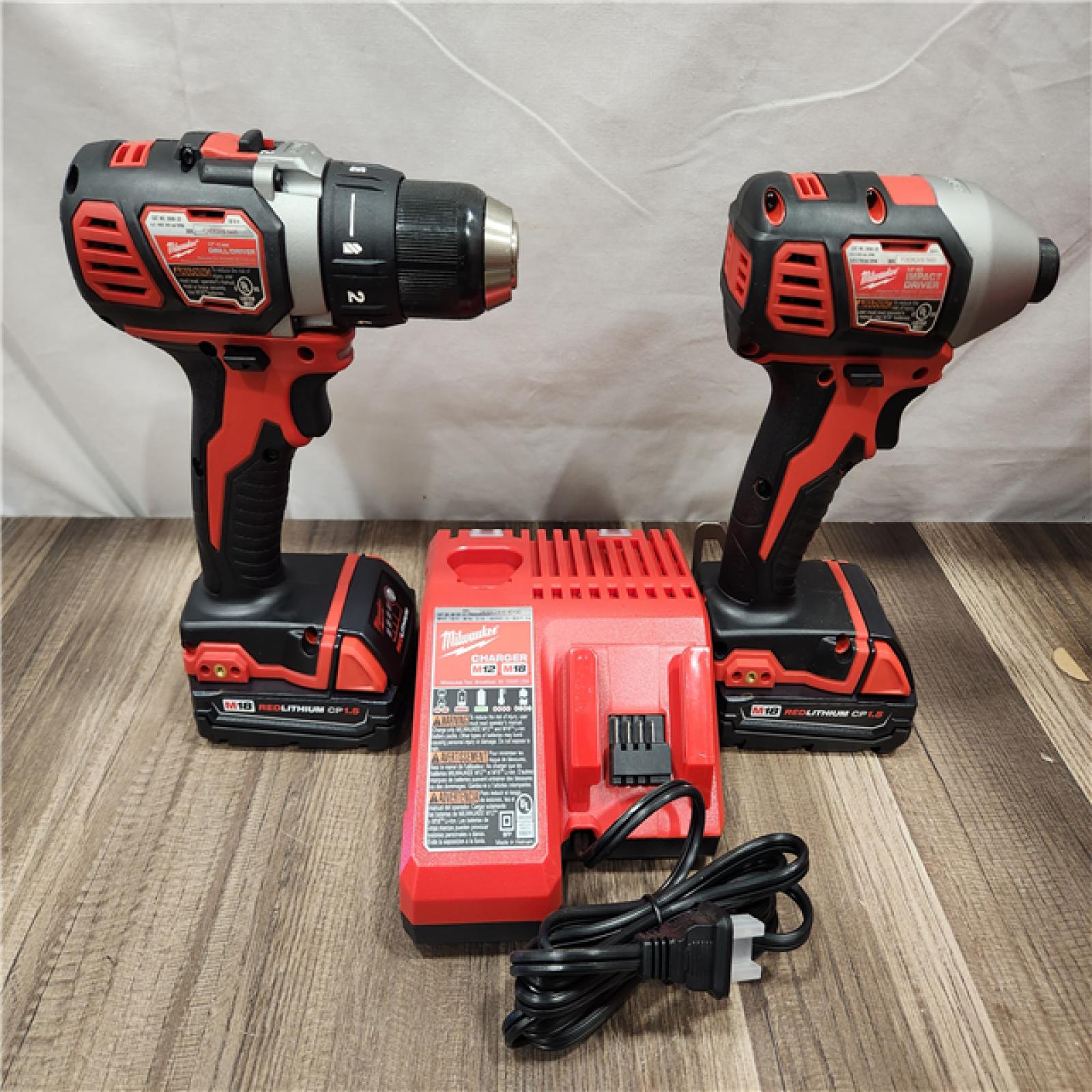 AS-IS- Milwaukee 18V Cordless Brushed 2-Tool Drill/Driver and Impact Driver Kit