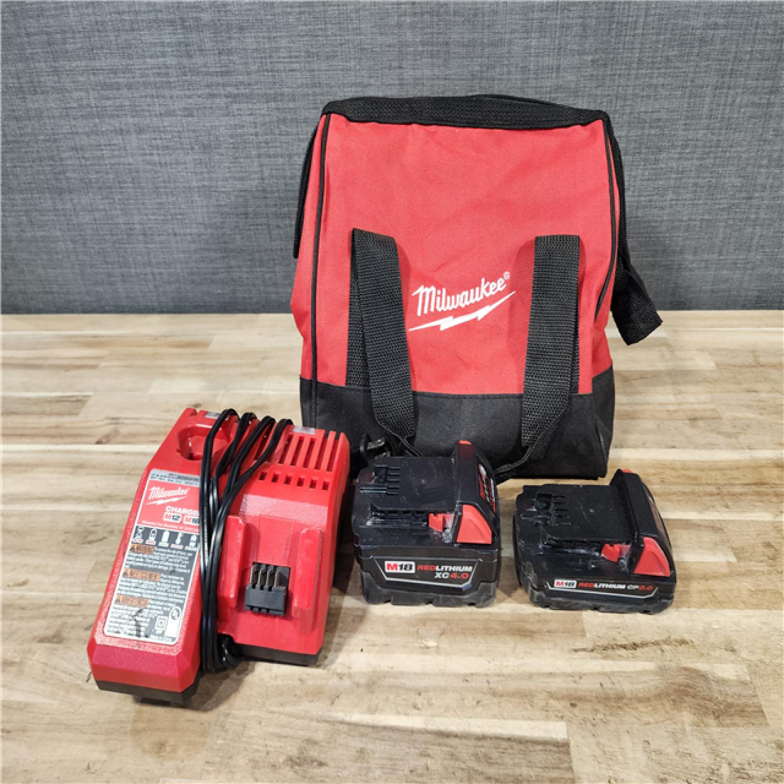 HOUSTON LOCATION - AS-IS Milwaukee 18-Volt Lithium-Ion Brushless Cordless Compact Hammer Drill/Impact Combo Kit
