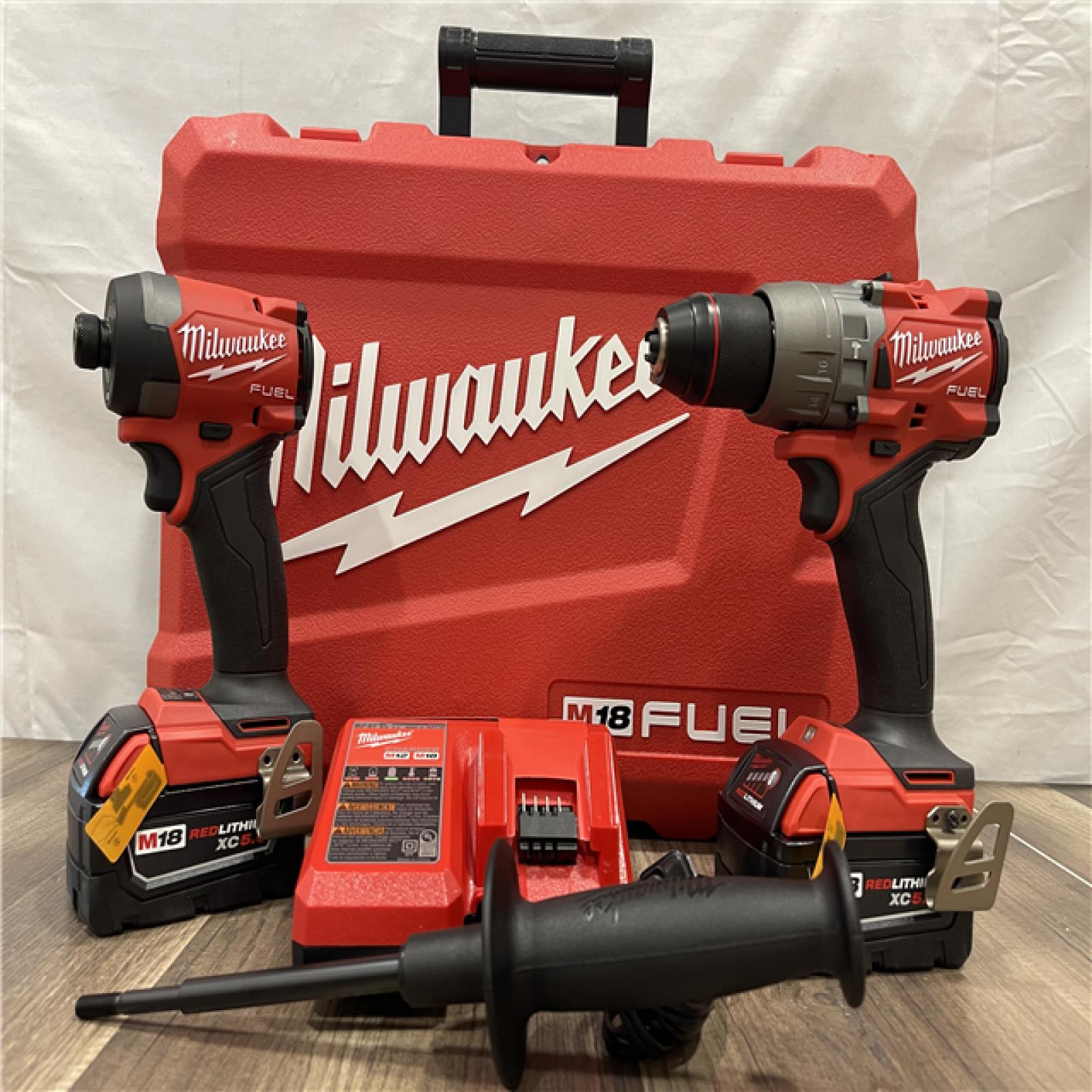 AS-IS Milwaukee M18 FUEL 18V Lithium-Ion Brushless Cordless Hammer Drill and Impact Driver Combo Kit