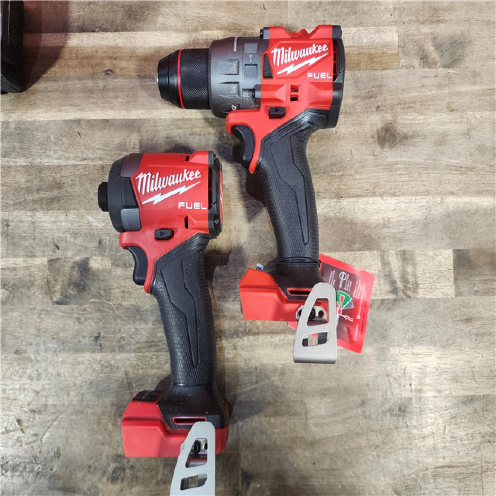 HOUSTON LOCATION - AS-IS (APPEARS LIKE NEW) MILWAUKEE FUEL 18V Lithium-Ion Brushless Cordless Hammer Drill and Impact Driver Combo Kit (2-Tool) with 2 Batteries