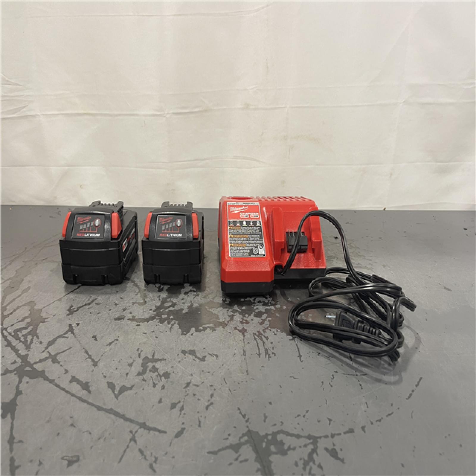 AS-IS- M18 18-Volt Lithium-Ion XC Starter Kit with Two 5.0Ah Batteries and Charger