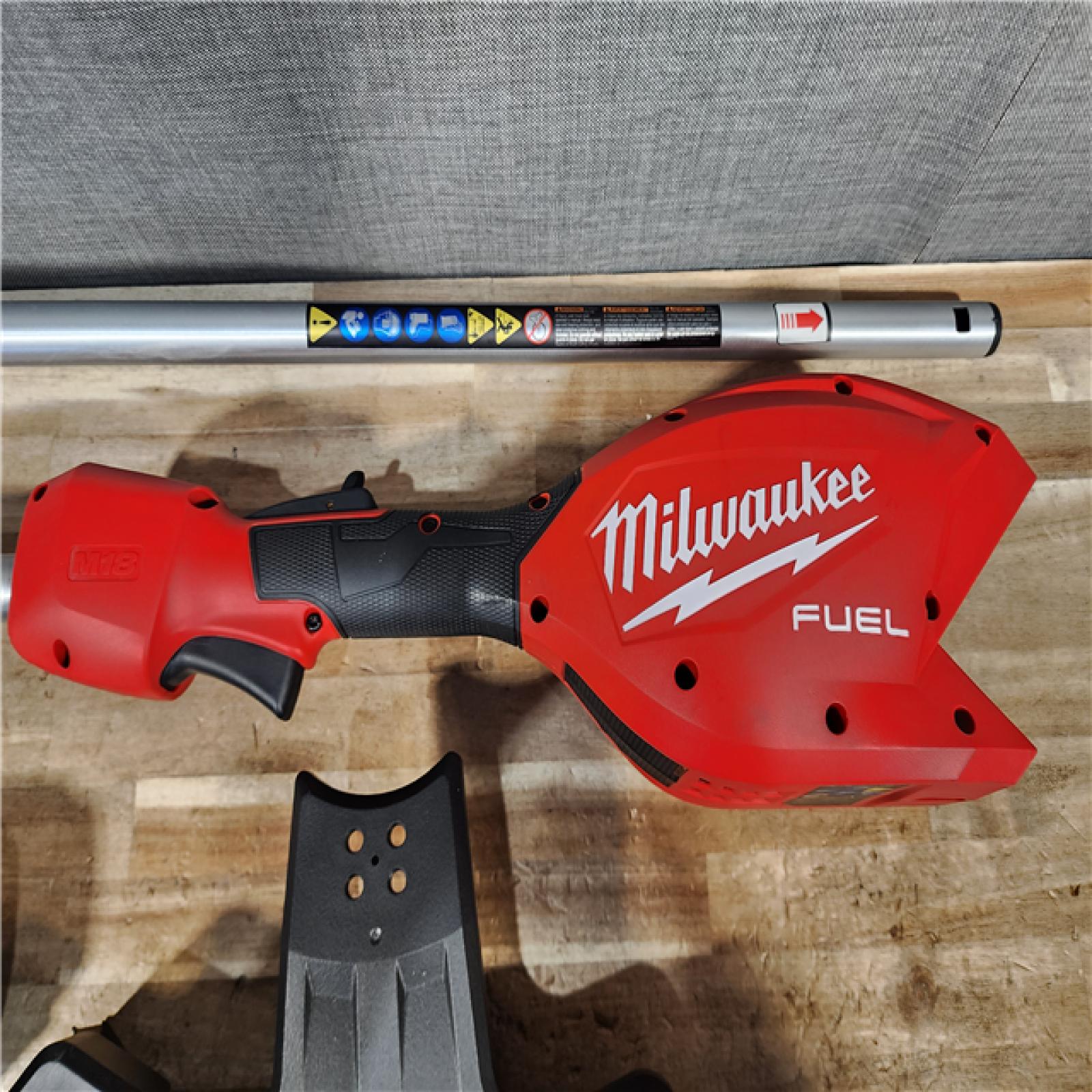 HOUSTON LOCATION - AS - IS Milwaukee FUEL 18V 16 in. Brushless Cordless Battery Powered String Trimmer Kit