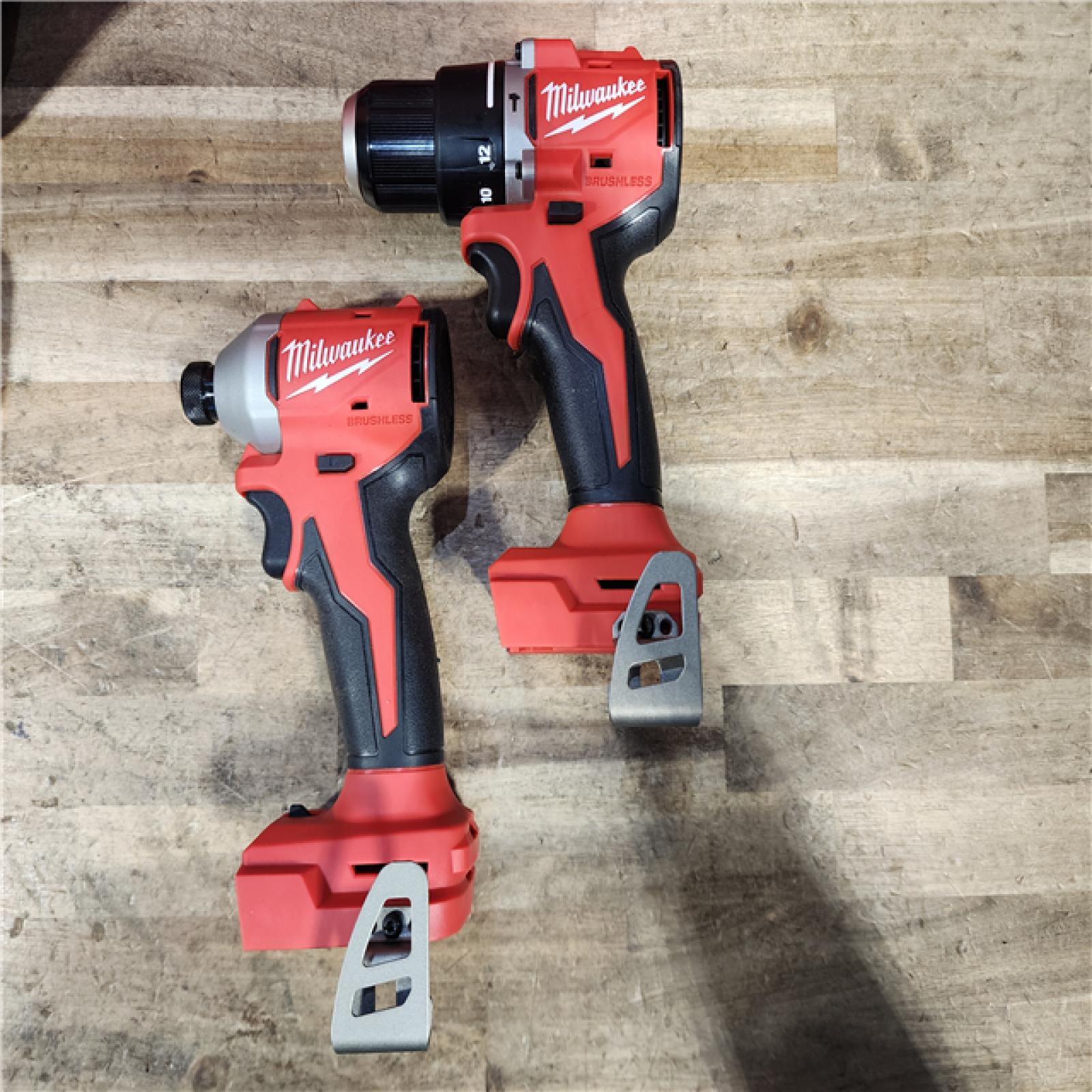 HOUSTON LOCATION - AS-IS M18 18-Volt Lithium-Ion Brushless Cordless Compact Hammer Drill/Impact Combo Kit (2-Tool) with (2) Batteries  Bag