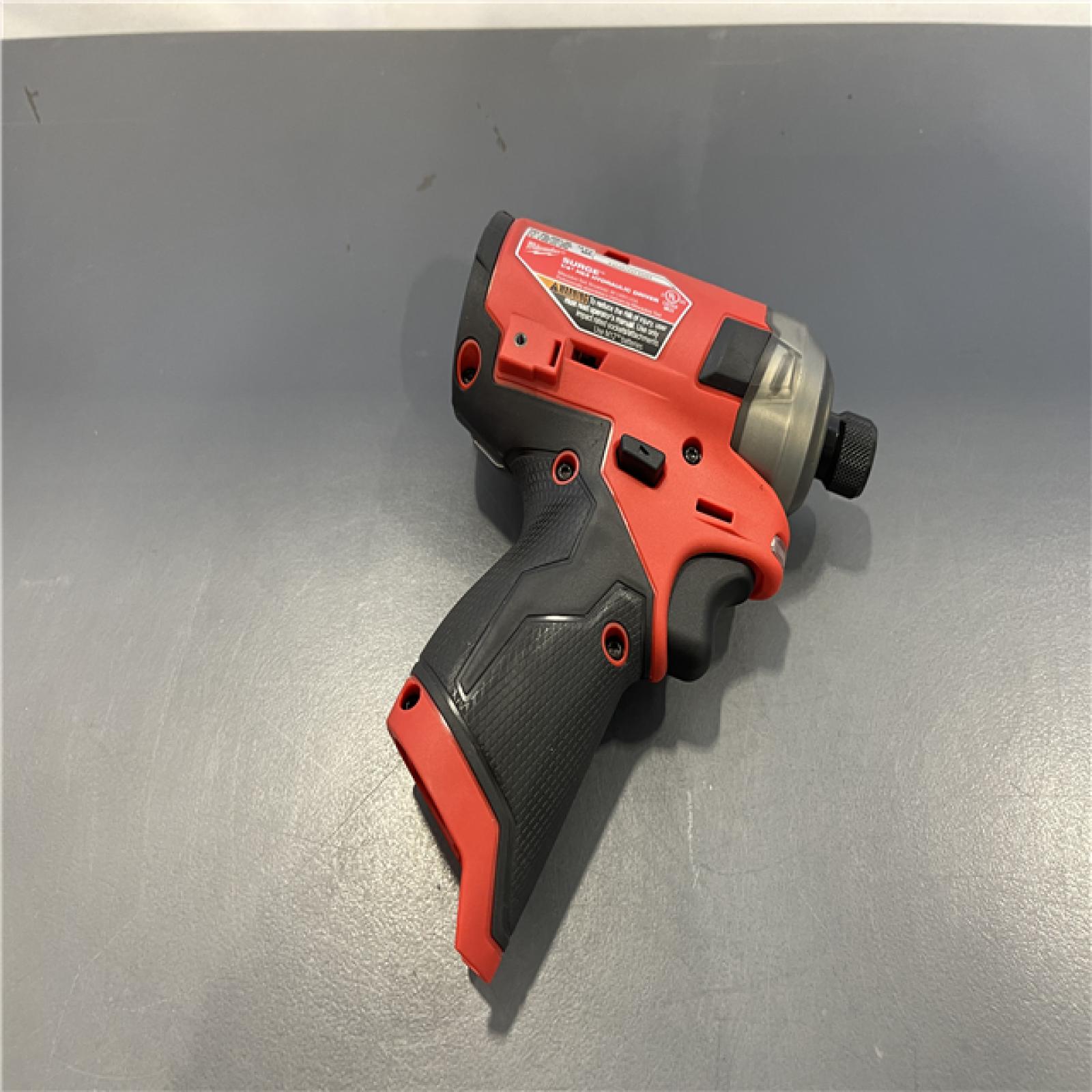 Like New! - Milwaukee M12 FUEL SURGE 12V Lithium-Ion Brushless Cordless 1/4 in. Hex Impact Driver Compact Kit W/Two 2.0Ah Batteries, Bag