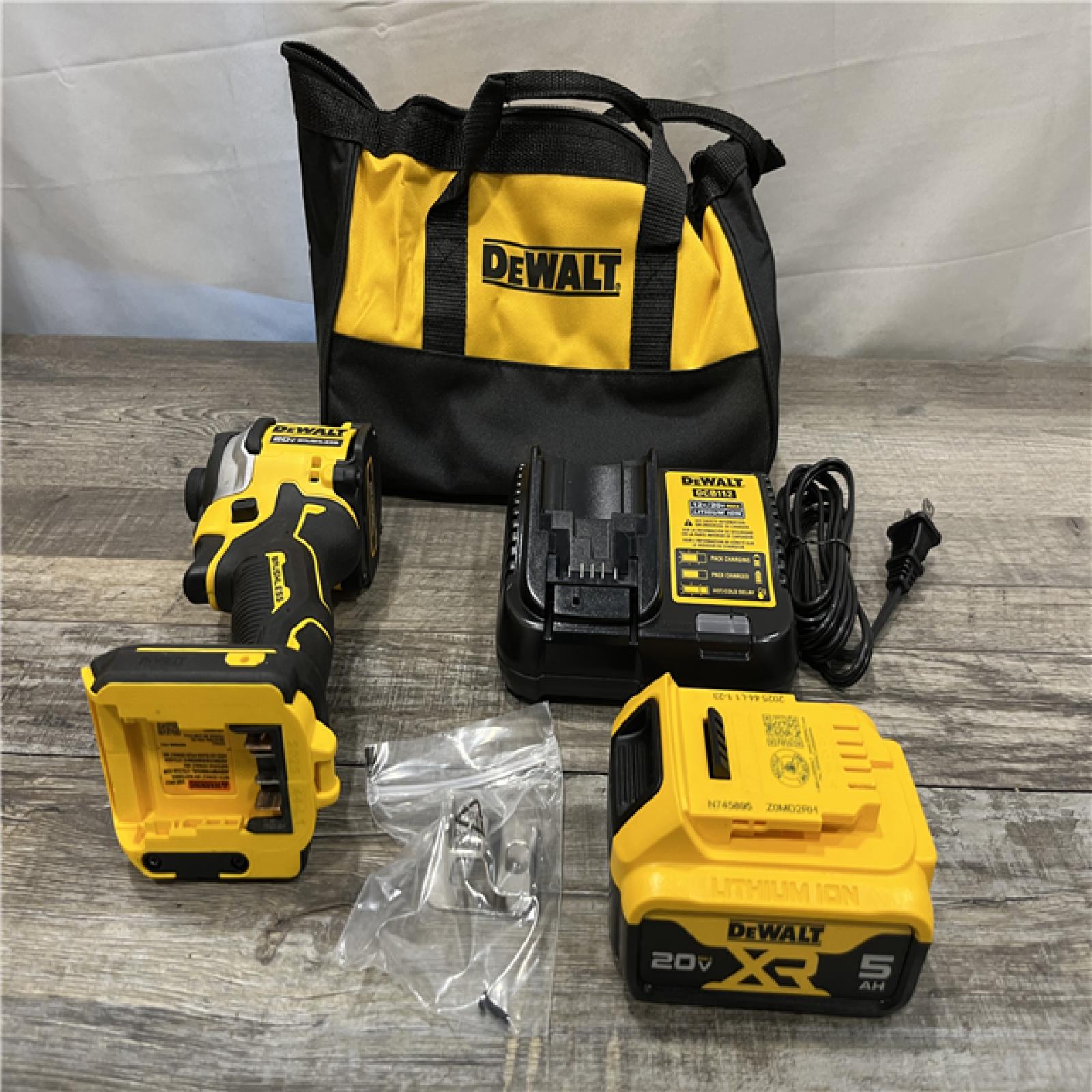 AS-IS DEWALT ATOMIC 20V MAX Lithium-Ion Cordless 1/4 in. Brushless Impact Driver Kit