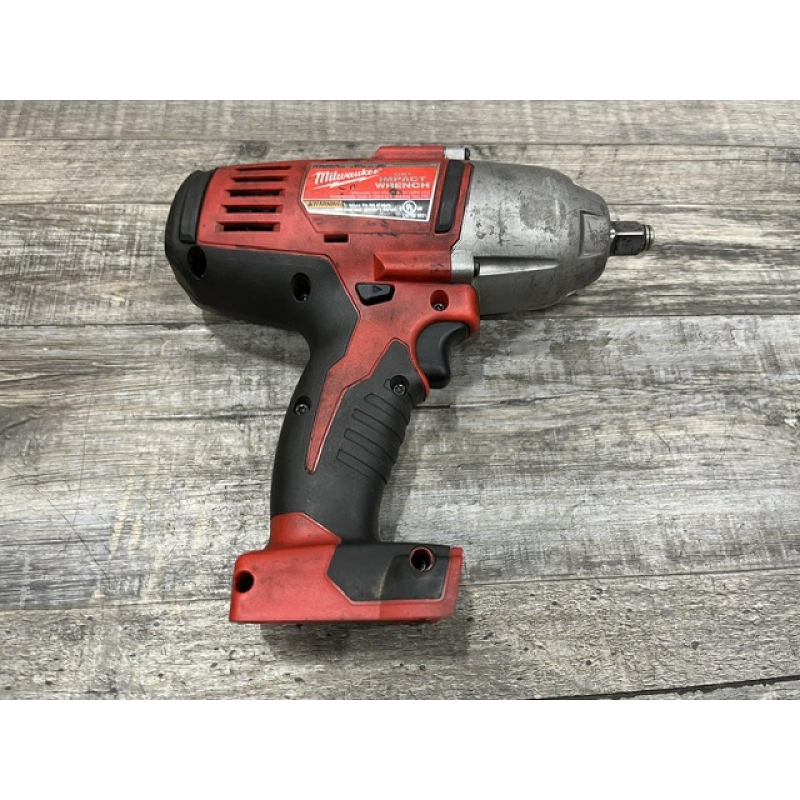 AS-IS Milwaukee 18V Lithium-Ion Cordless 1/2 in. Impact Wrench W/ Friction Ring (Tool-Only)