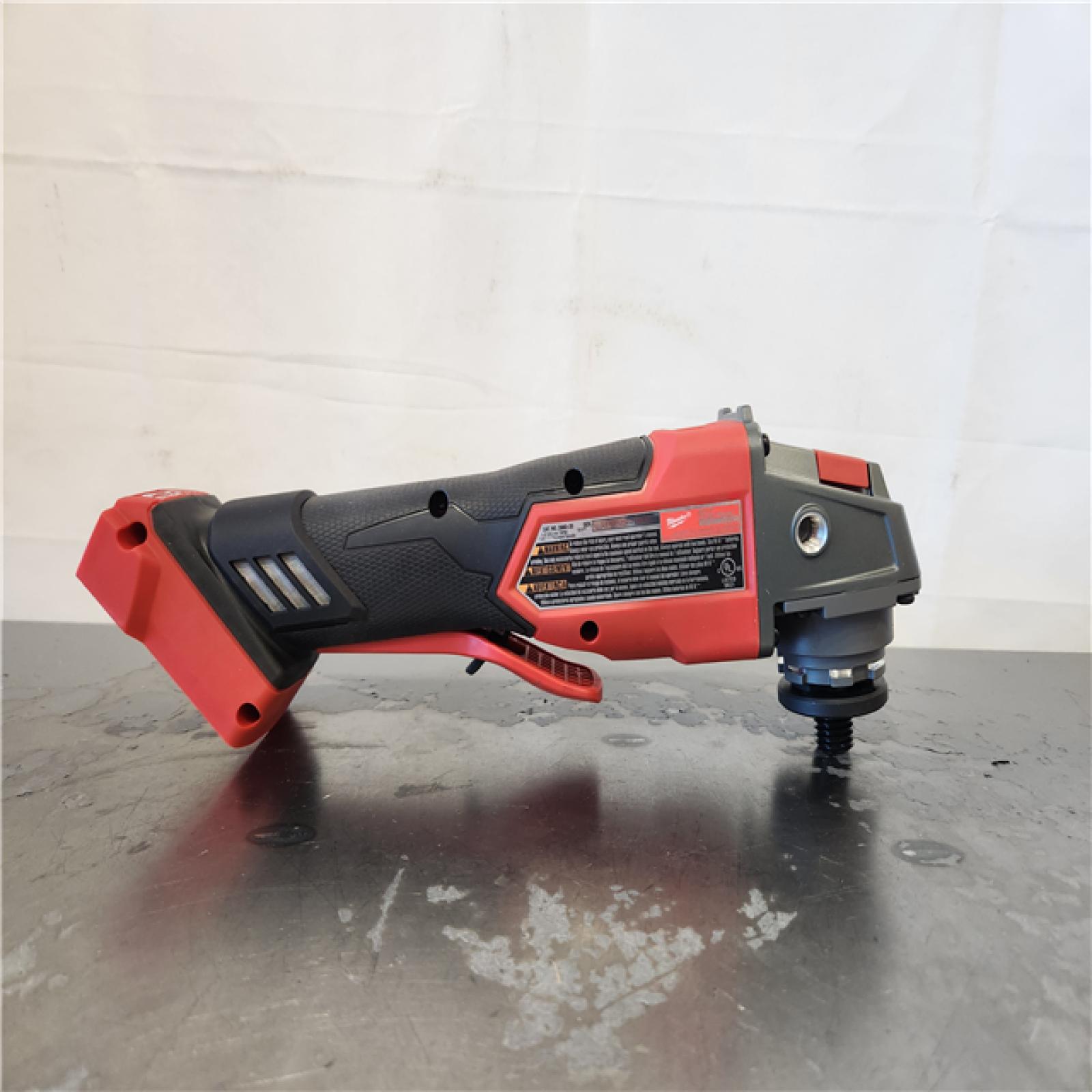 AS-IS- Milwaukee FUEL 18-Volt Lithium-Ion Brushless Cordless 4-1/2 in./5 in. Grinder W/Paddle Switch (Tool-Only)