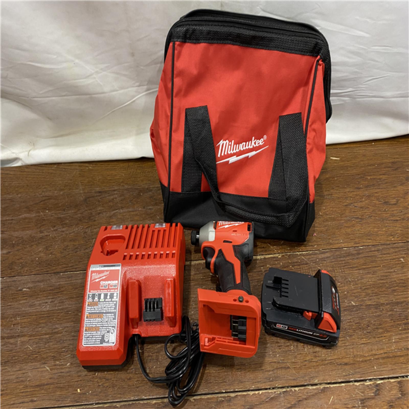 AS-IS Milwaukee M18 Compact Brushless 1/4  Hex Impact Driver Kit