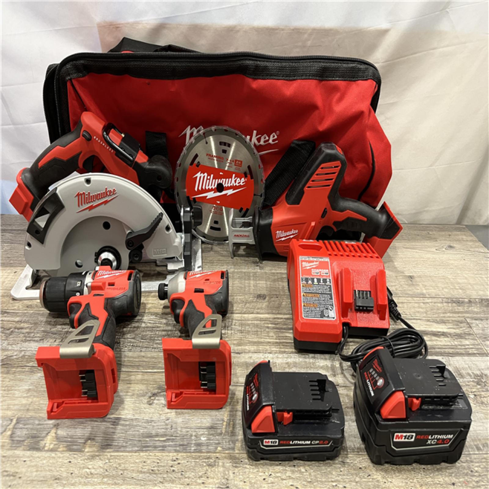 AS-IS Milwaukee 18-Volt Lithium-Ion Brushless Cordless (4-Tool) Combo Kit