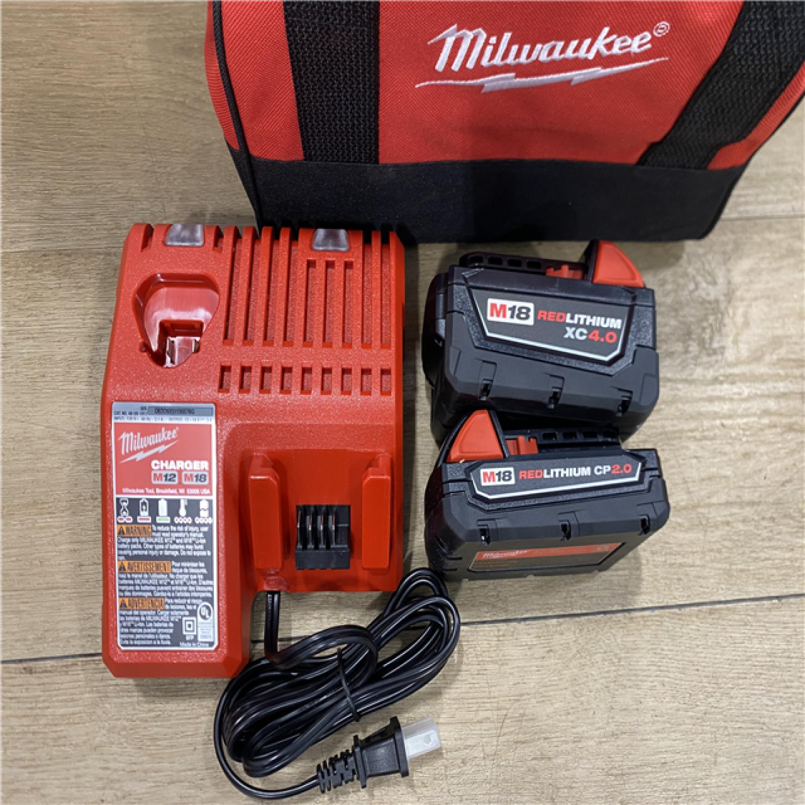AS-IS Milwaukee 18-Volt Lithium-Ion Brushless Cordless Compact Hammer Drill/Impact Combo Kit