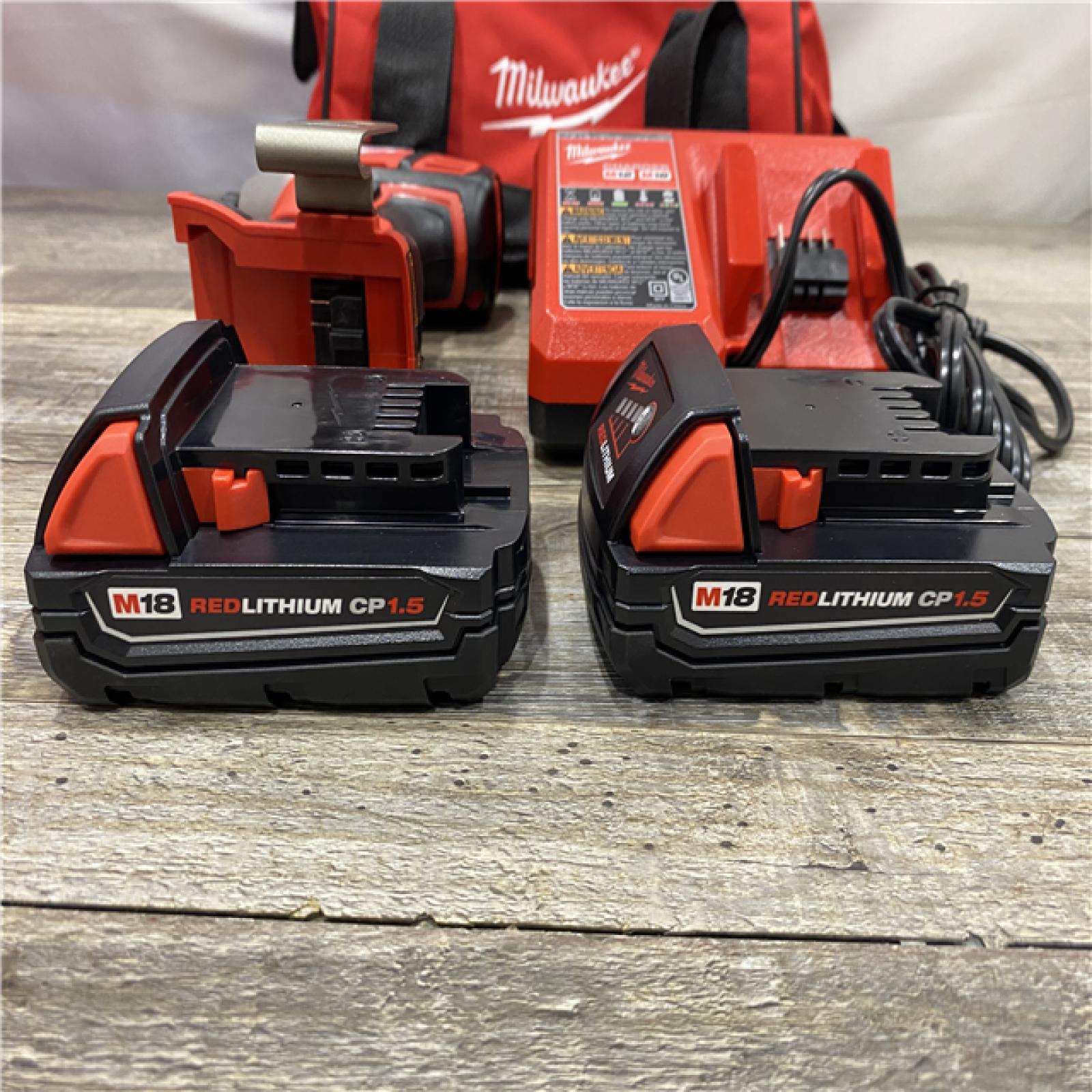 AS-IS Milwaukee 18V Lithium-Ion Cordless 1/4 in. Impact Driver Kit