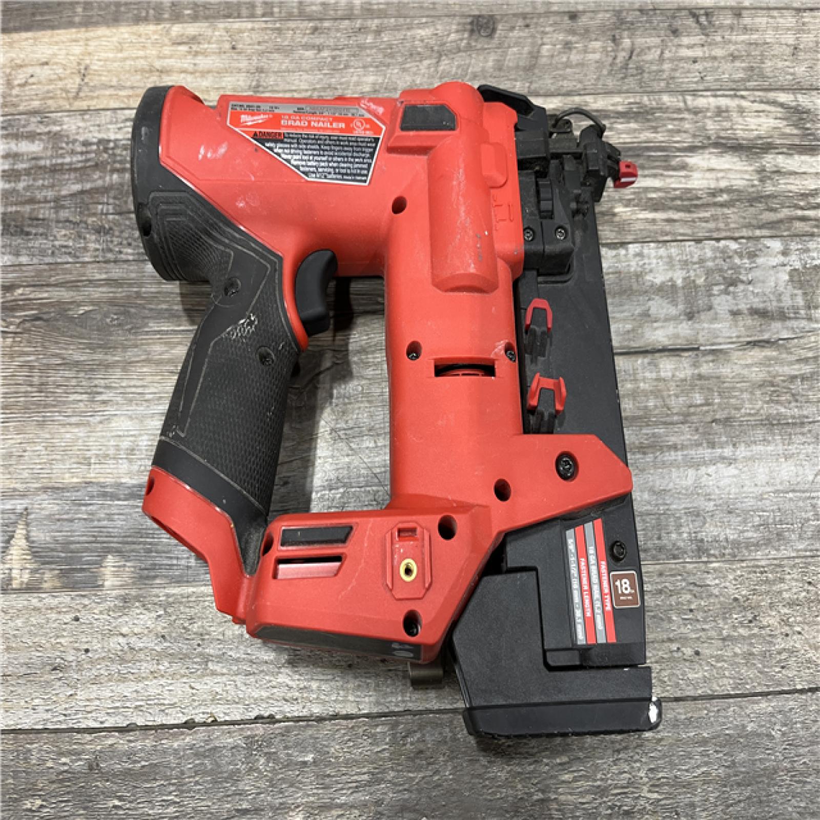 AS-IS Milwaukee FUEL 12-Volt Lithium-Ion Brushless Cordless 18-Gauge 1-1/2 in. Compact Brad Nailer (Tool Only)