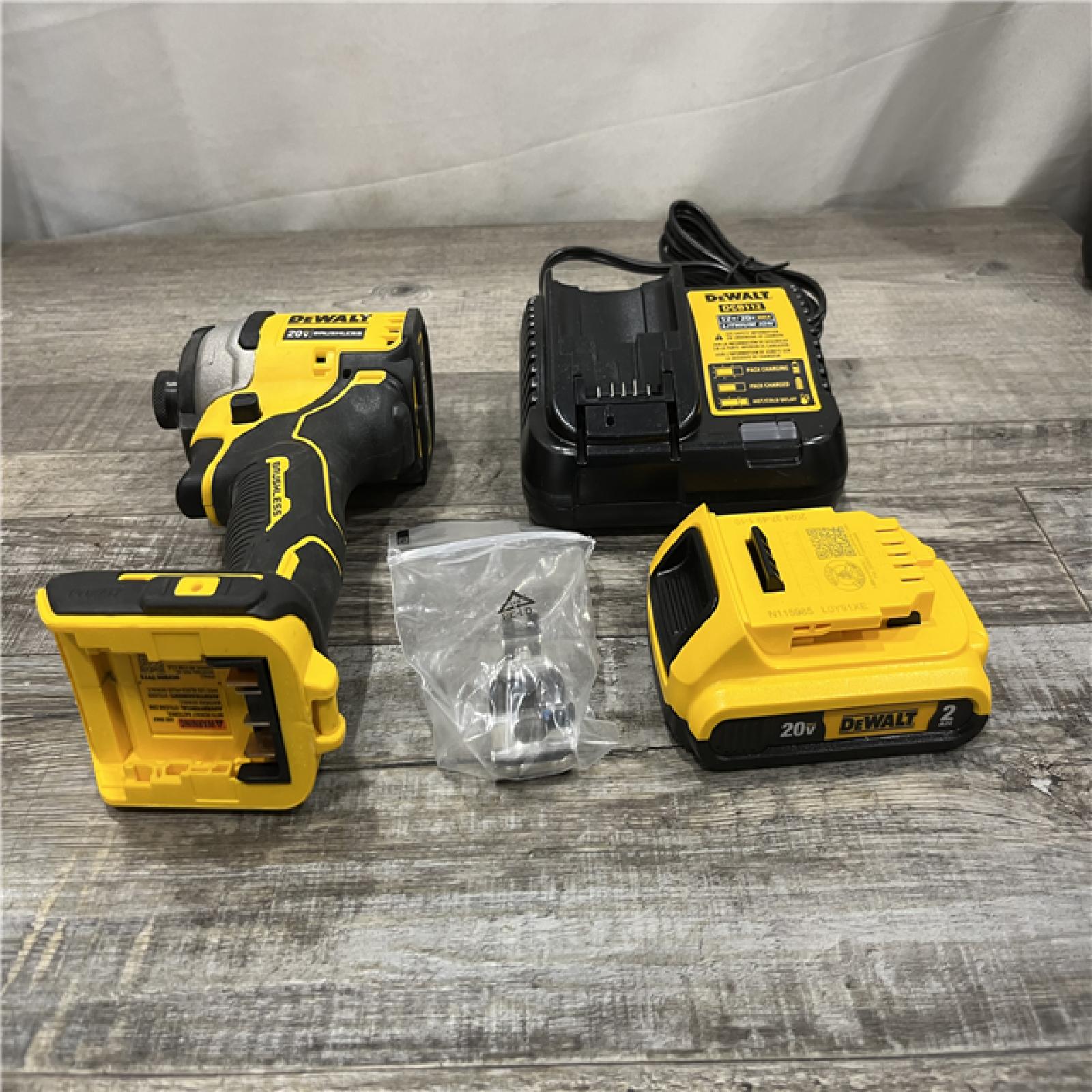 AS-IS DEWALT Atomic 20V Max Lithium-Ion Brushless Cordless Compact 1/4 in. Impact Driver Kit