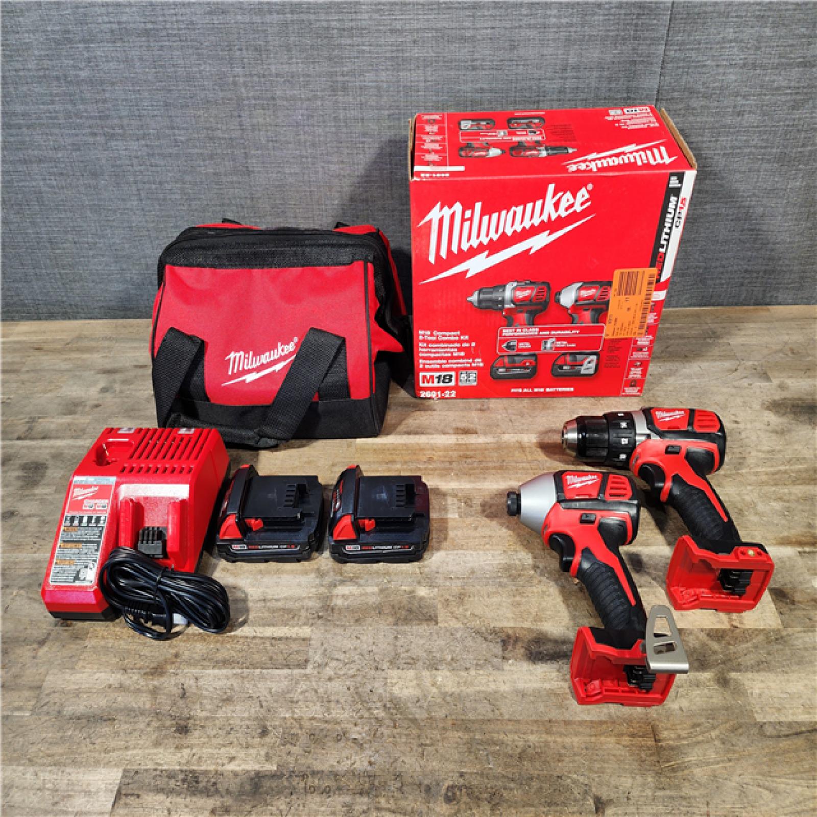 HOUSTON LOCATION - AS-IS Milwaukee 18V Cordless Brushed 2-Tool Drill/Driver and Impact Driver Kit