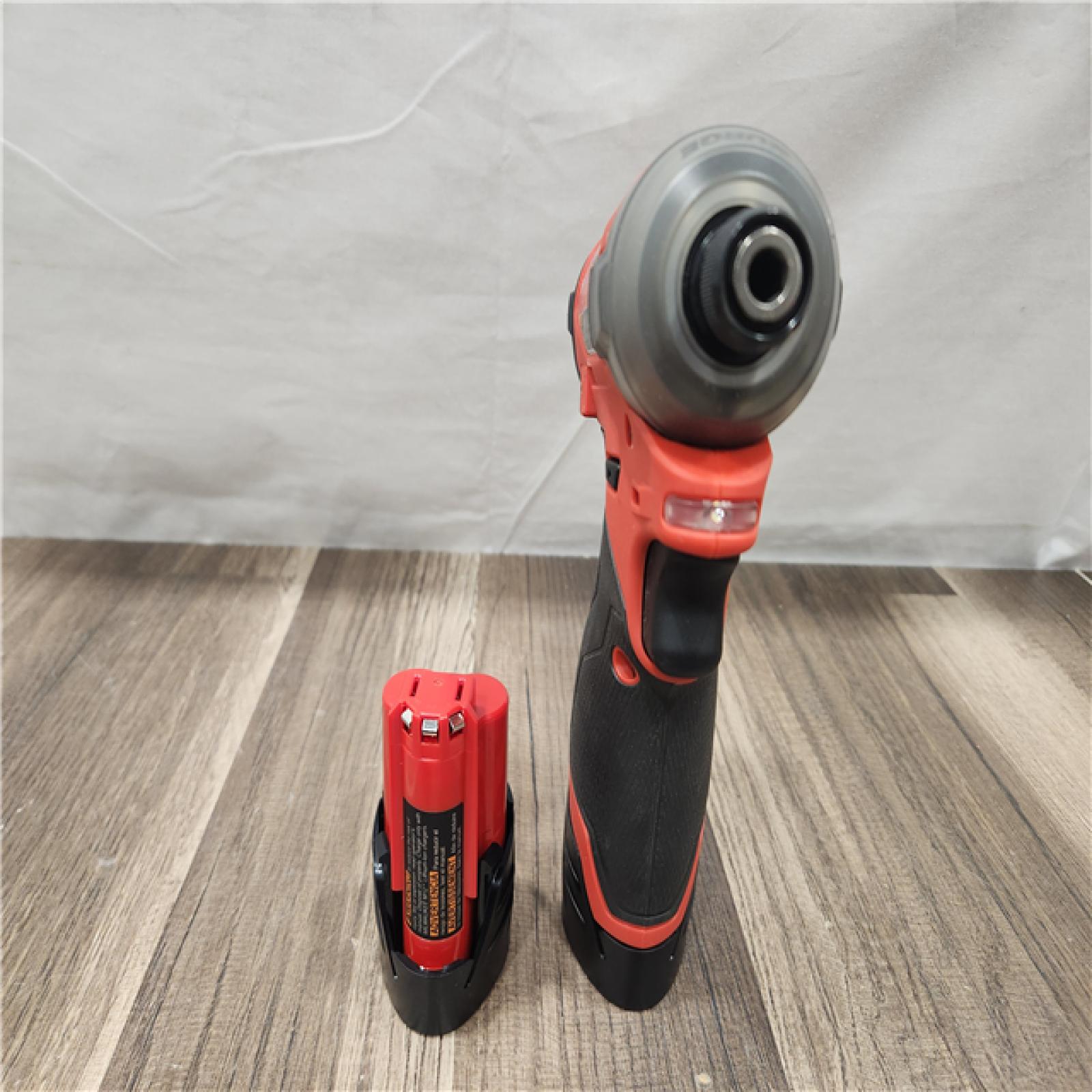 AS-IS- Milwaukee M12 FUEL SURGE 12V Lithium-Ion Brushless Cordless 1/4 in. Hex Impact Driver Compact Kit W/Two 2.0Ah Batteries  Bag