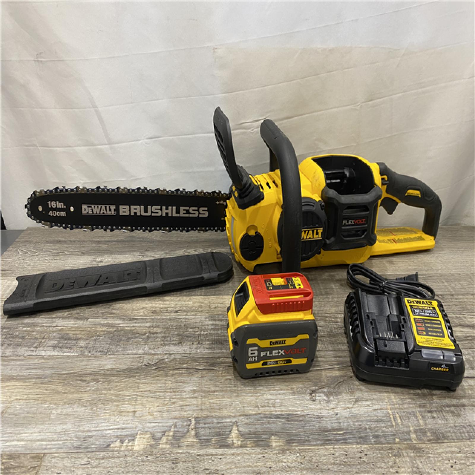 AS-IS DEWALT FLEXVOLT 60V MAX 16in. Brushless Cordless Battery Powered Chainsaw Kit