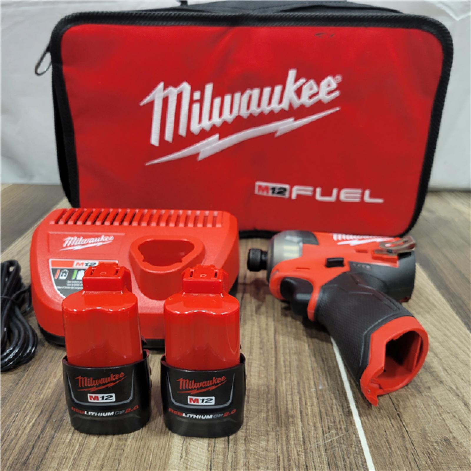 AS-IS Milwaukee 2M12 FUEL SURGE 12V Lithium-Ion Brushless Cordless 1/4 in. Hex Impact Driver Compact Kit W/Two 2.0Ah Batteries, Bag