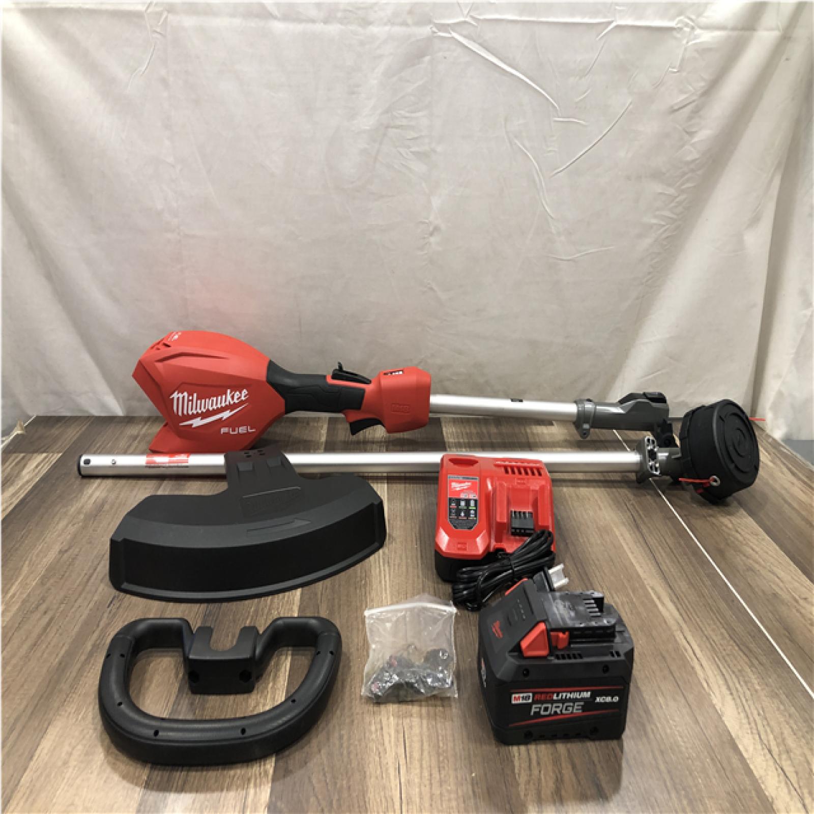 AS-IS Milwaukee FUEL 18V 16 in. Brushless Cordless Battery Powered String Trimmer Kit