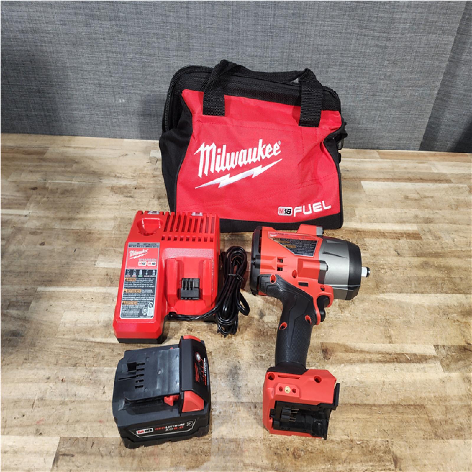 Houston Location AS-IS Milwaukee FUEL 18V Lithium-Ion Brushless Cordless 1/2 in. Impact Wrench w/Friction Ring Kit