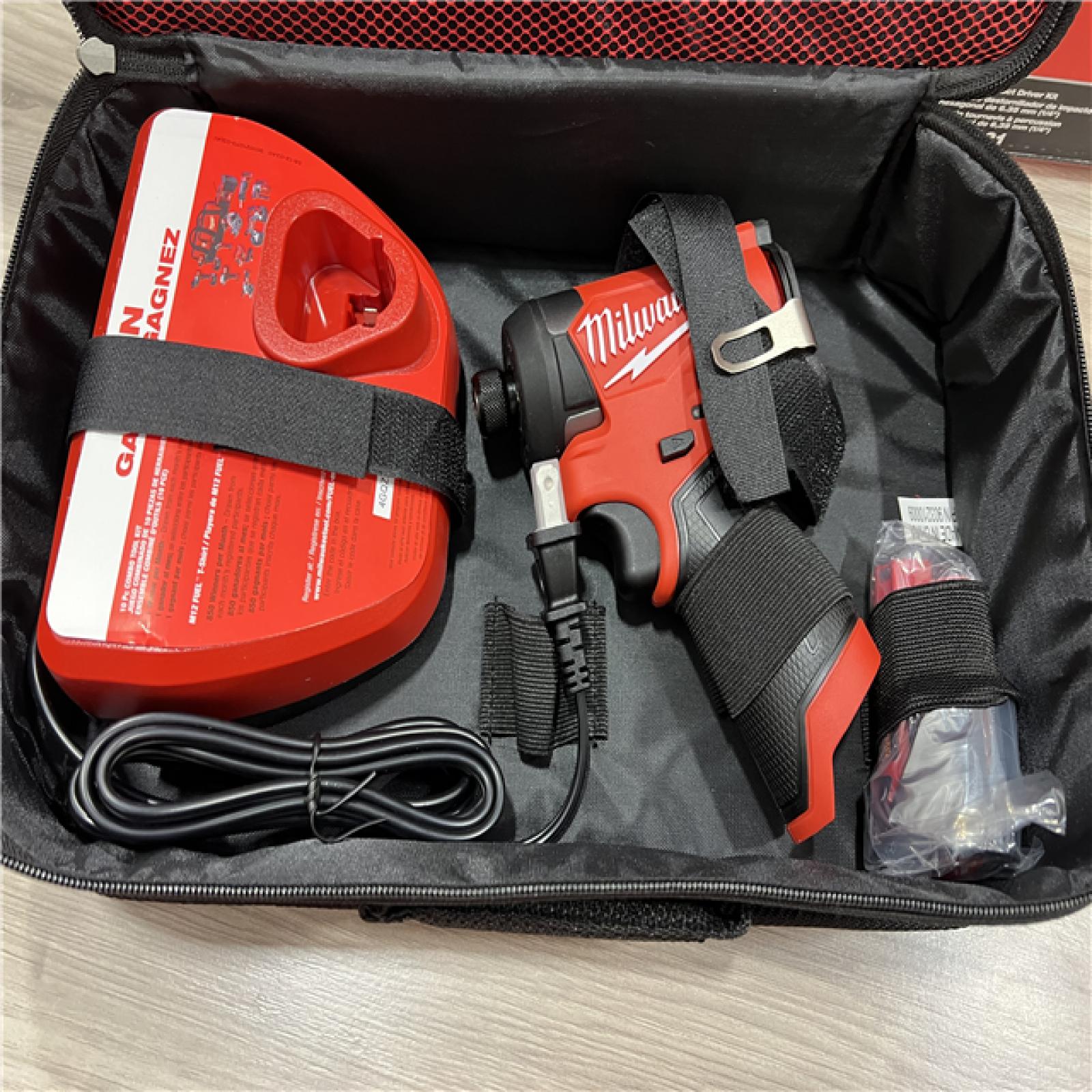 AS-IS Milwaukee  FUEL 12-Volt Lithium-Ion Brushless Cordless 1/4 in. Hex Impact Driver Compact Kit