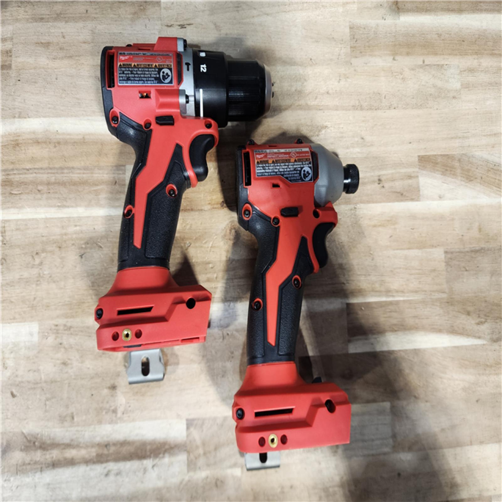 HOUSTON LOCATION - AS-IS M18 18-Volt Lithium-Ion Brushless Cordless Compact Hammer Drill/Impact Combo Kit (2-Tool) with (2) Batteries  Bag