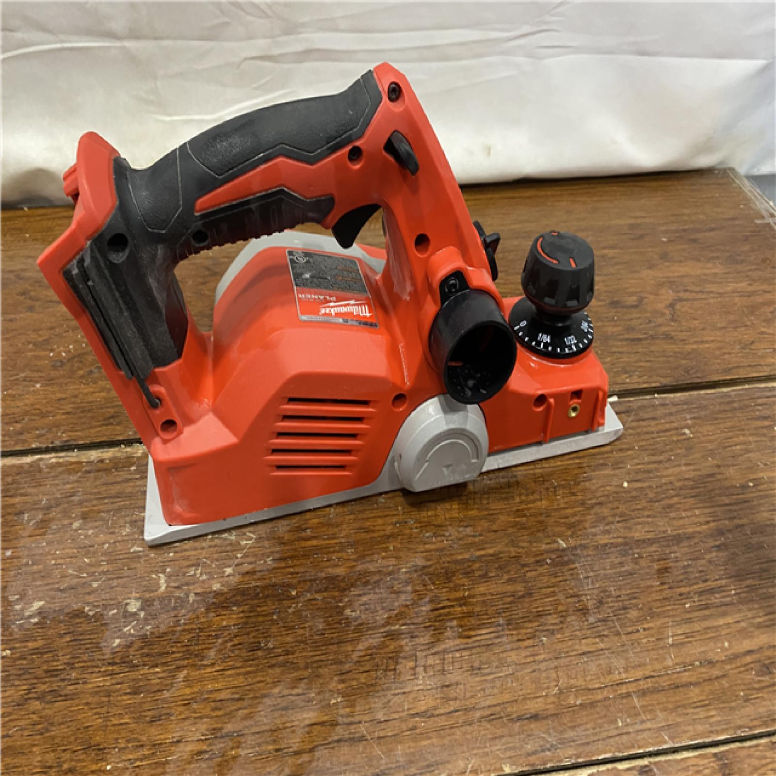 AS-IS Milwaukee M18 18-Volt Lithium-Ion Cordless 3-1/4 in. Planer (Tool-Only)