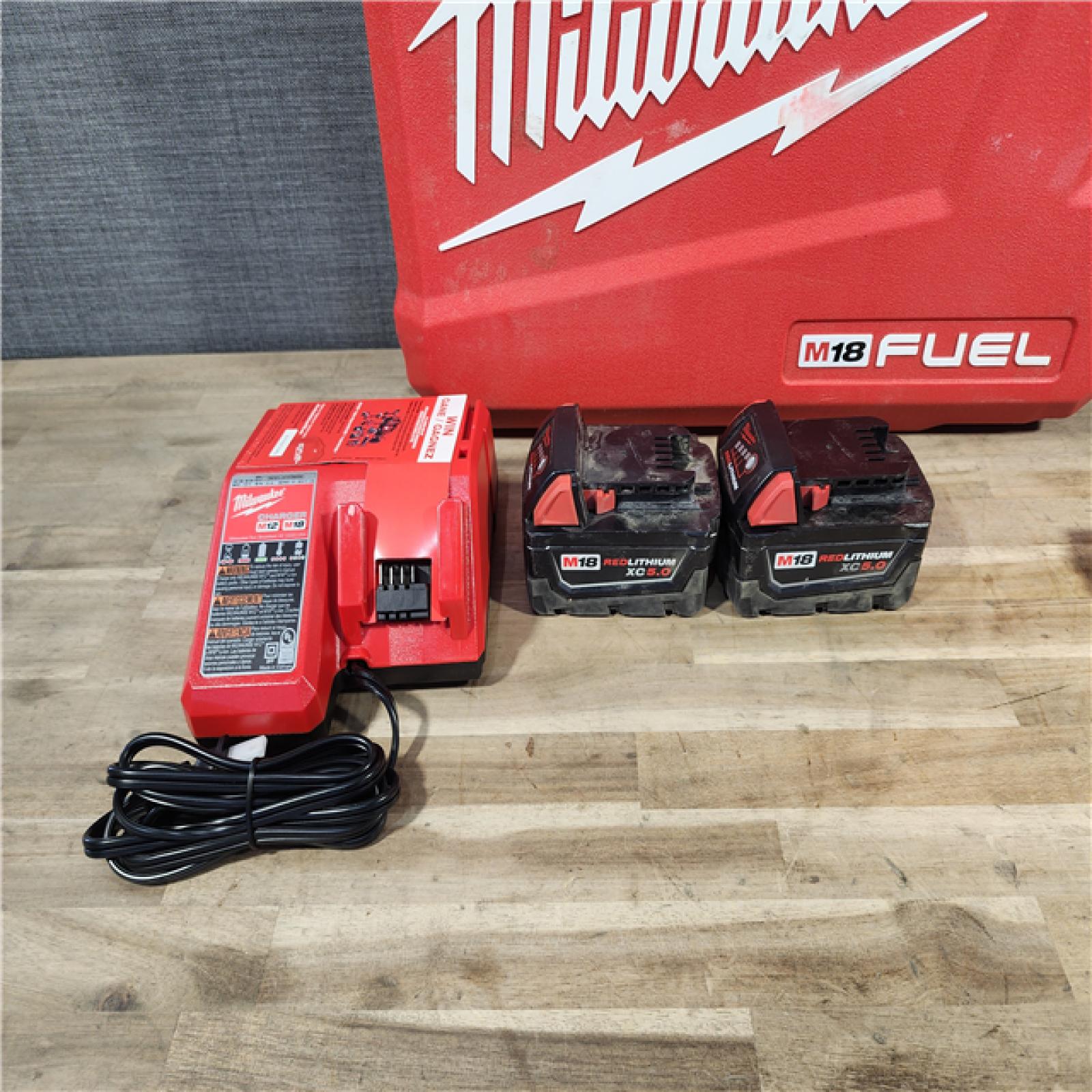 HOUSTON LOCATION - AS-IS MILWAUKEE FUEL 18V Lithium-Ion Brushless Cordless Hammer Drill and Impact Driver Combo Kit (2-Tool) with 2 Batteries