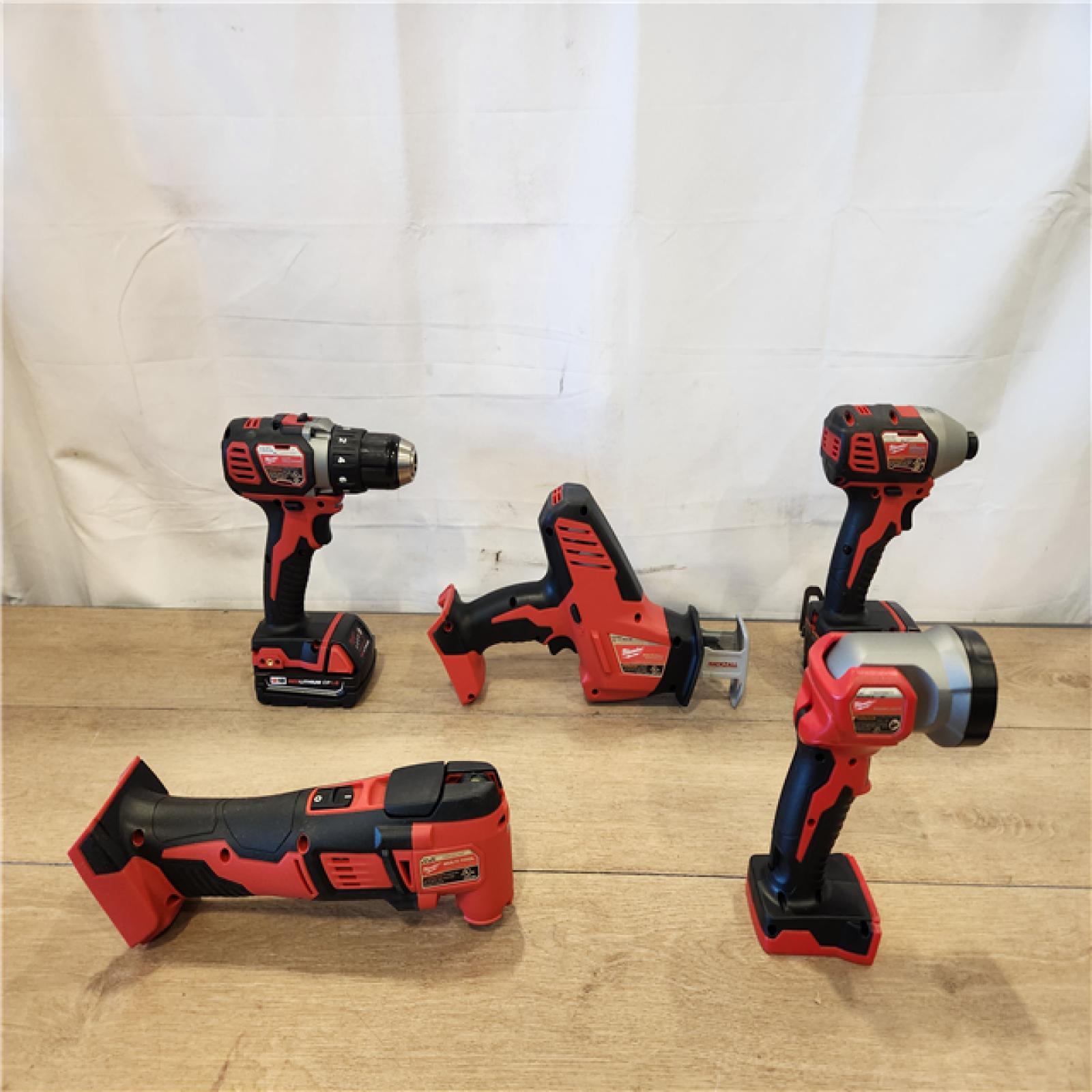 AS-IS- M18 18V Lithium-Ion Cordless Combo Kit (5-Tool) with (2) Batteries  Charger and Tool Bag