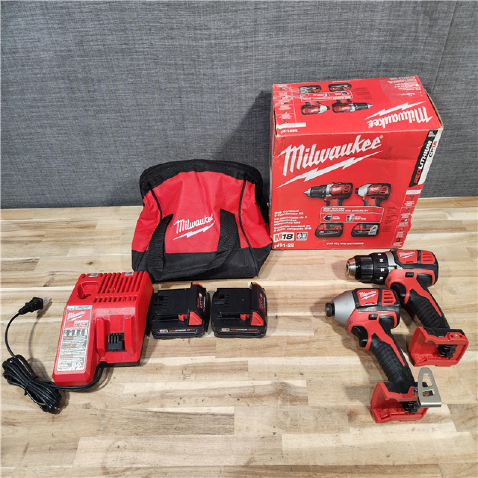 HOUSTON LOCATION - AS-IS Milwaukee 18V Lithium-Ion Cordless Drill Driver/Impact Driver Combo Kit