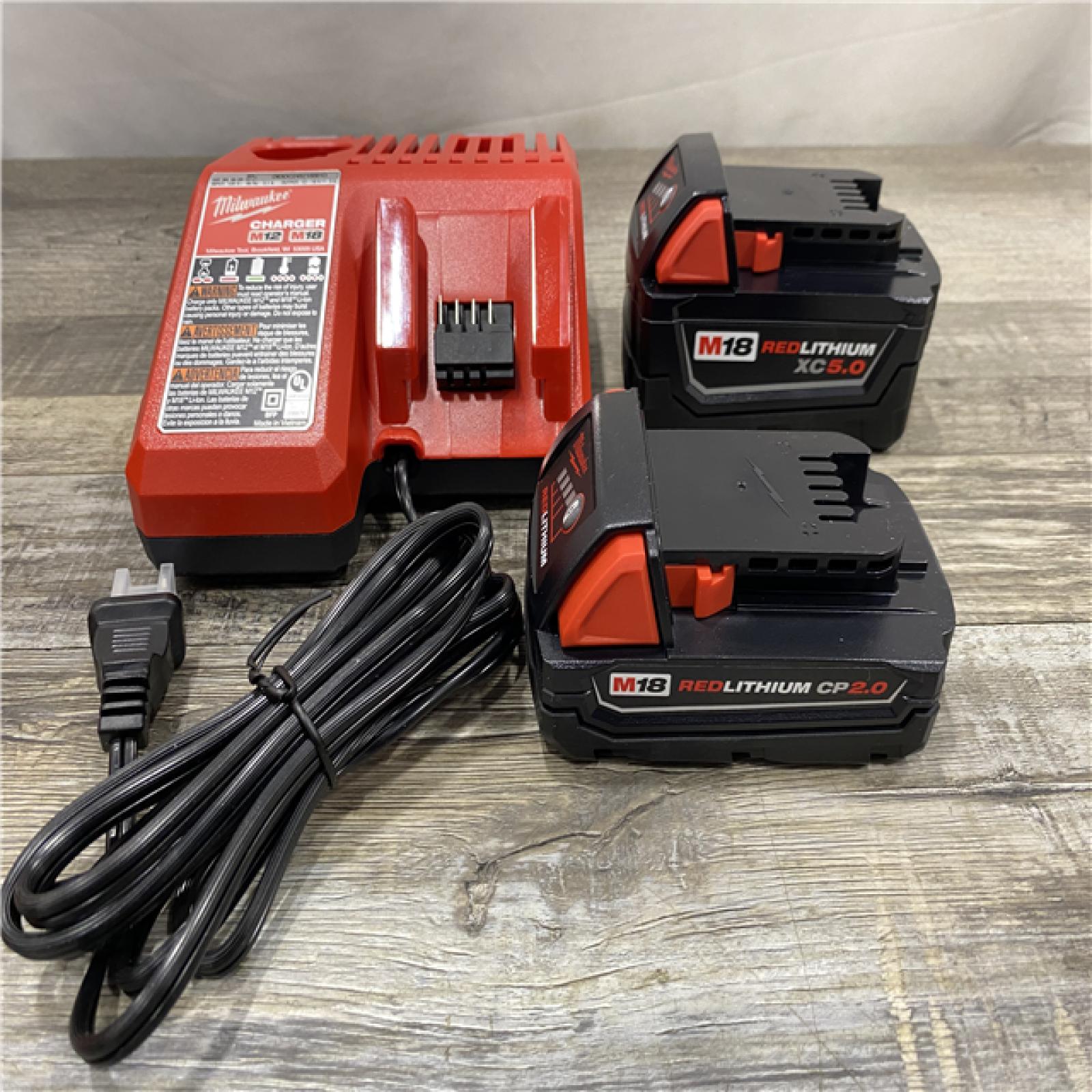 AS-IS Milwaukee 18-Volt Lithium-Ion Starter Kit with One 5.0 Ah and One 2.0 Ah Battery and Charger
