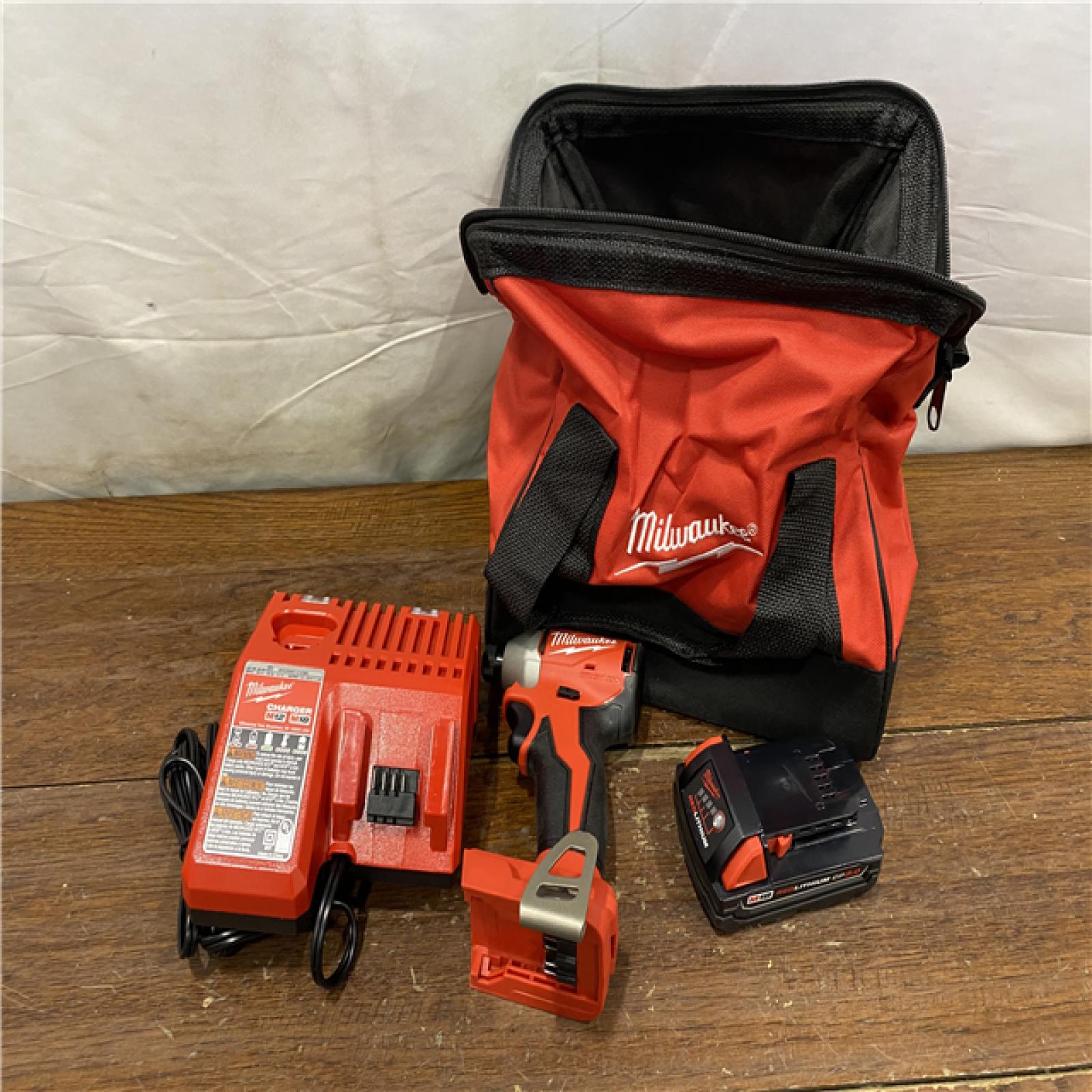 AS-IS Milwaukee M18 Compact Brushless 1/4  Hex Impact Driver Kit
