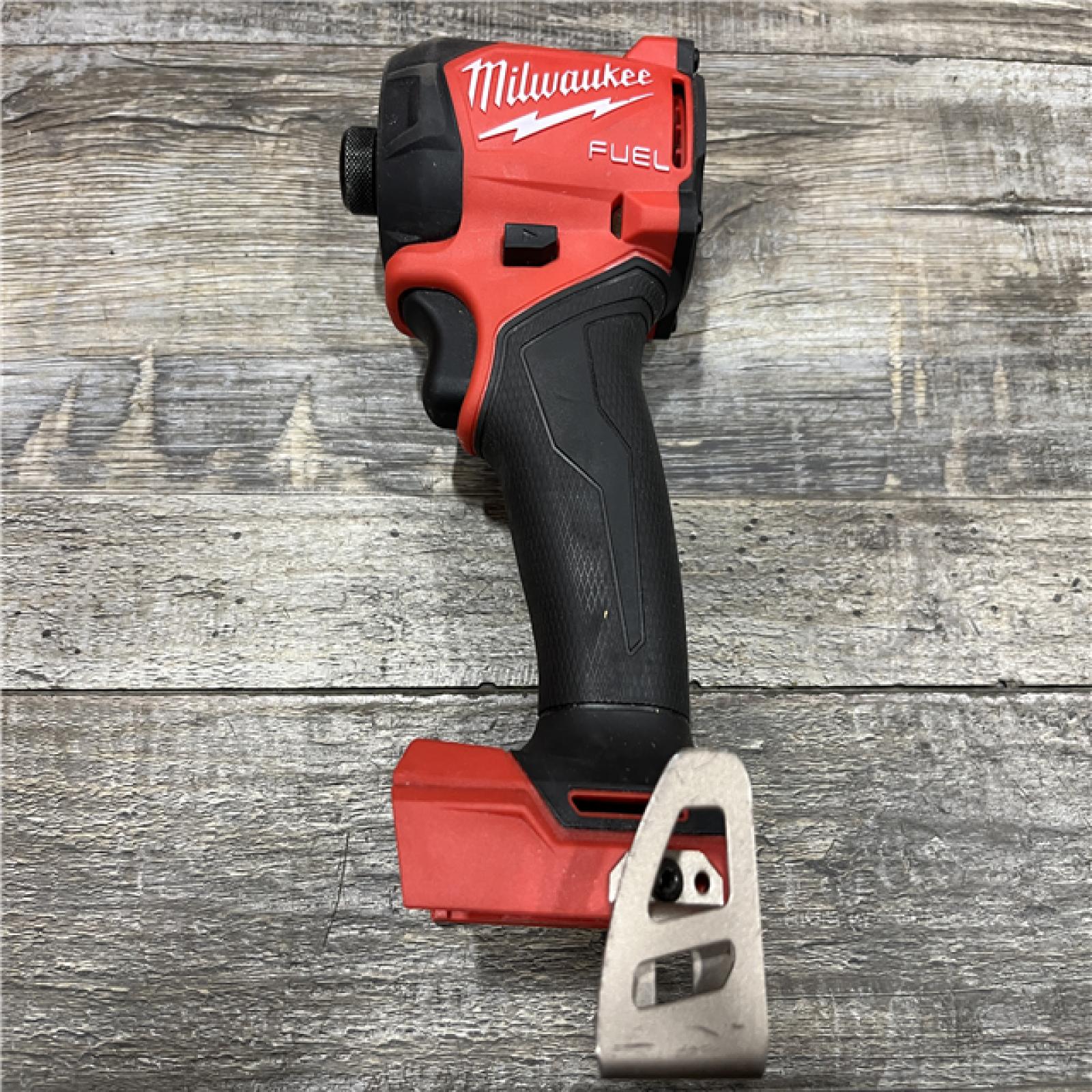 AS-IS Milwaukee FUEL SURGE 18V Lithium-Ion Brushless Cordless 1/4 in. Hex Impact Driver Kit